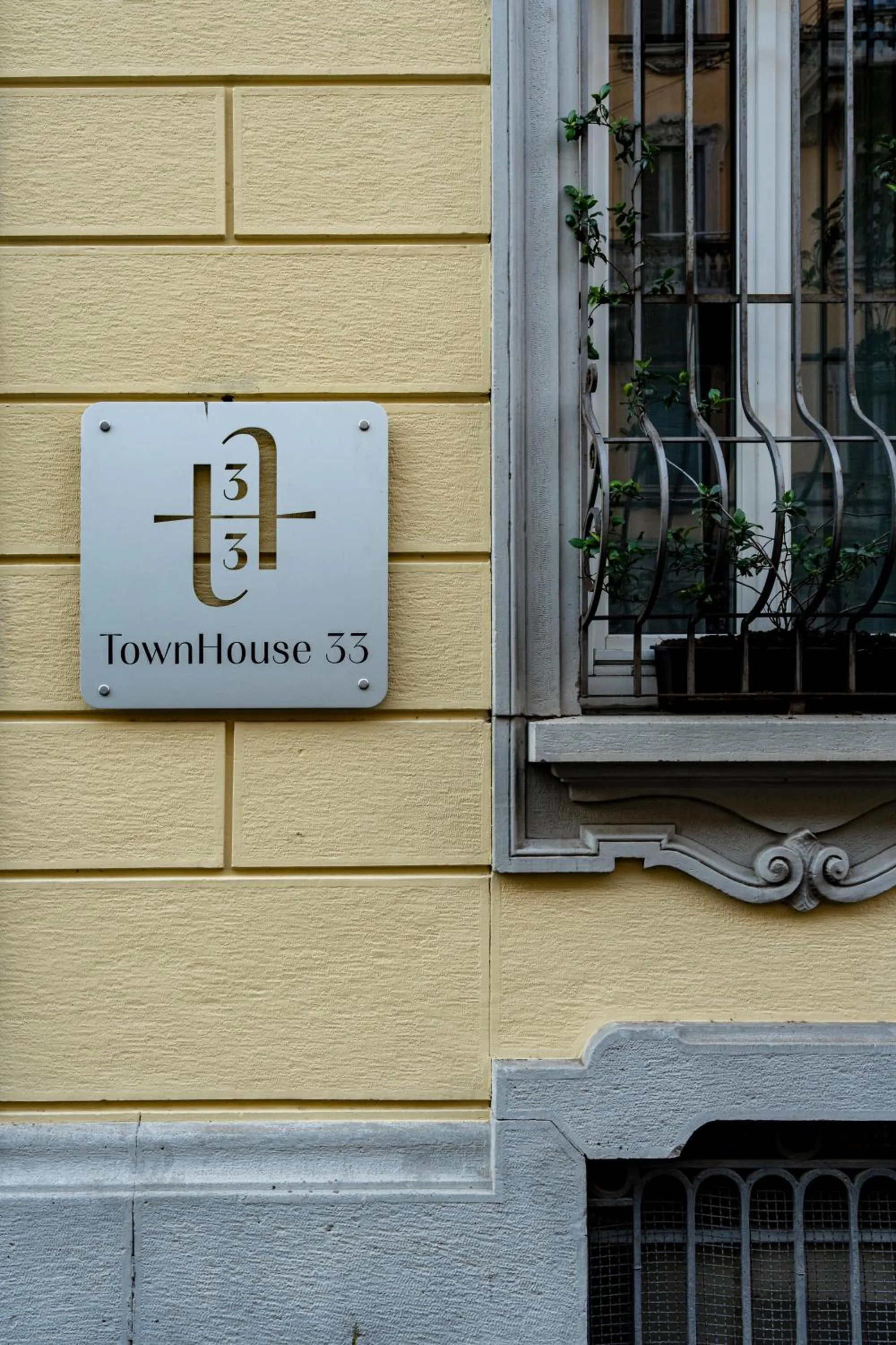 Property logo or sign in TownHouse 33 Boutique Hotel