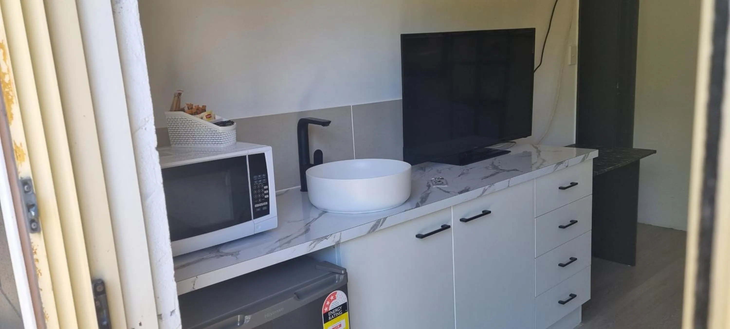 Kitchen or kitchenette in Buderim Fiesta Motel