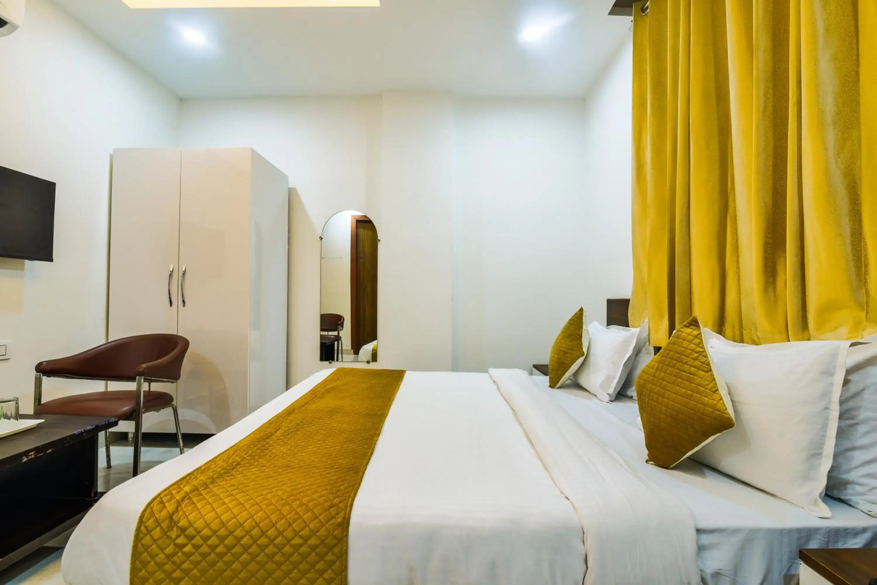 Photo of the whole room, Bed in Diplomat Regency Yashobhoomi Photo of the whole room, Bed in Diplomat Regency Yashobhoomi