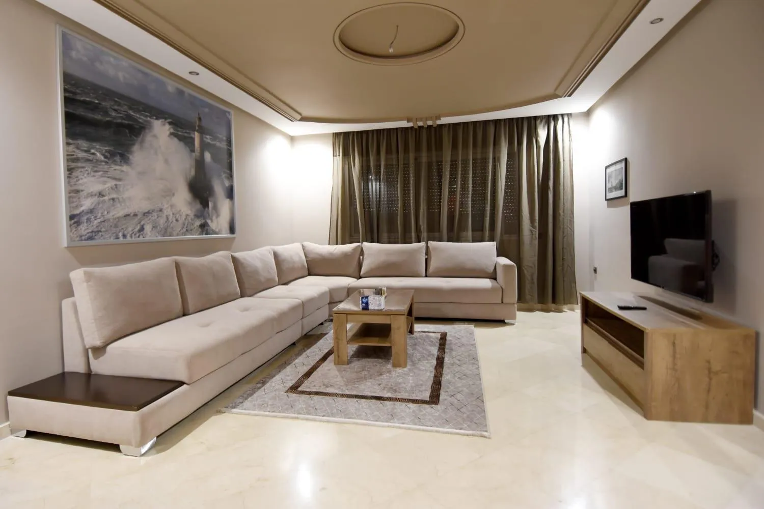 Communal lounge/ TV room in Hotel Appartement Tanger