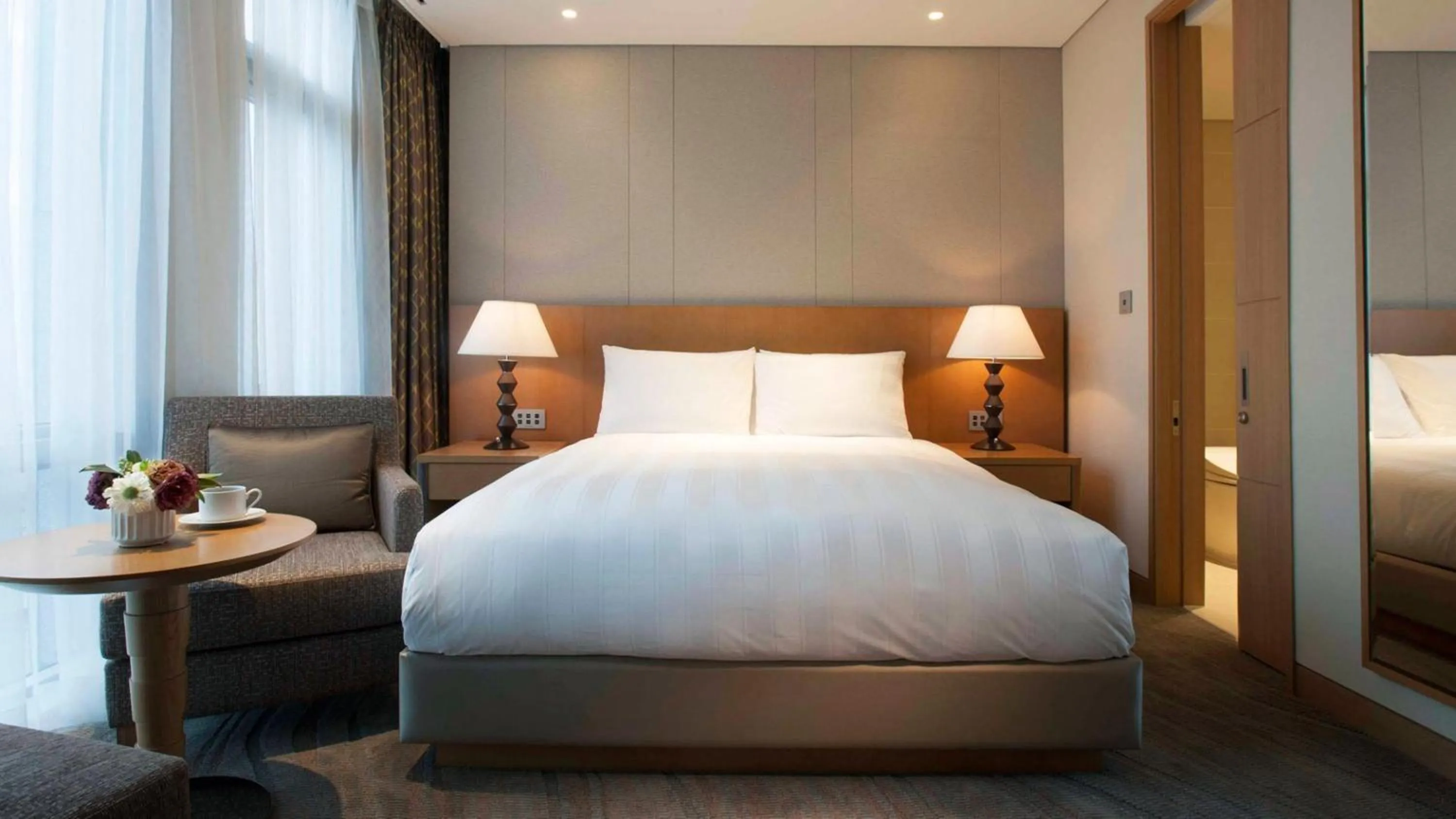 Bed in LOTTE CITY HOTEL Jeju Airport