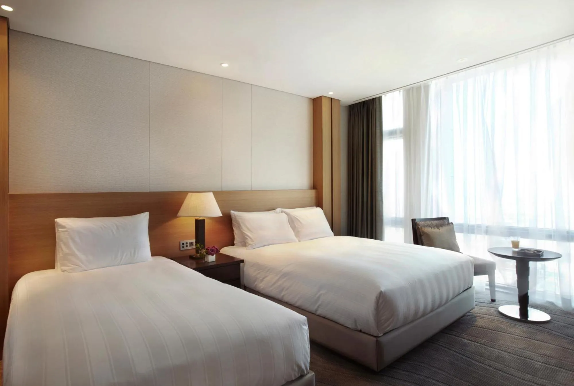 Bed in LOTTE CITY HOTEL Jeju Airport