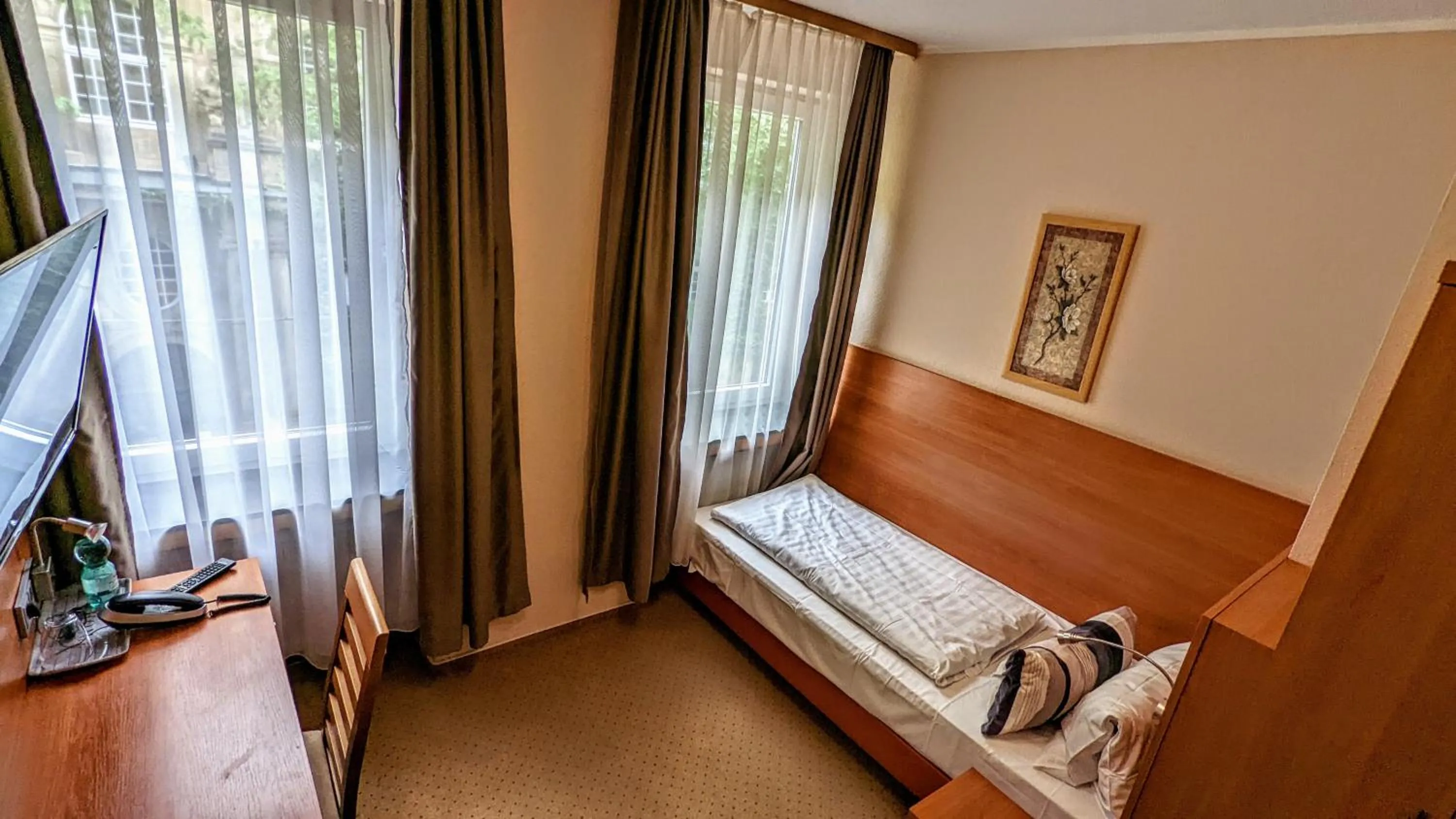 Bed in Hotel am Rathaus