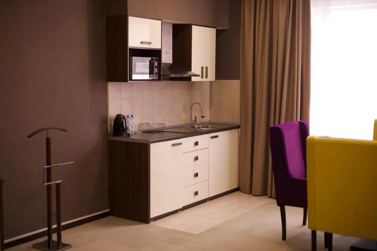 Kitchen or kitchenette in Marko Polo Hotel