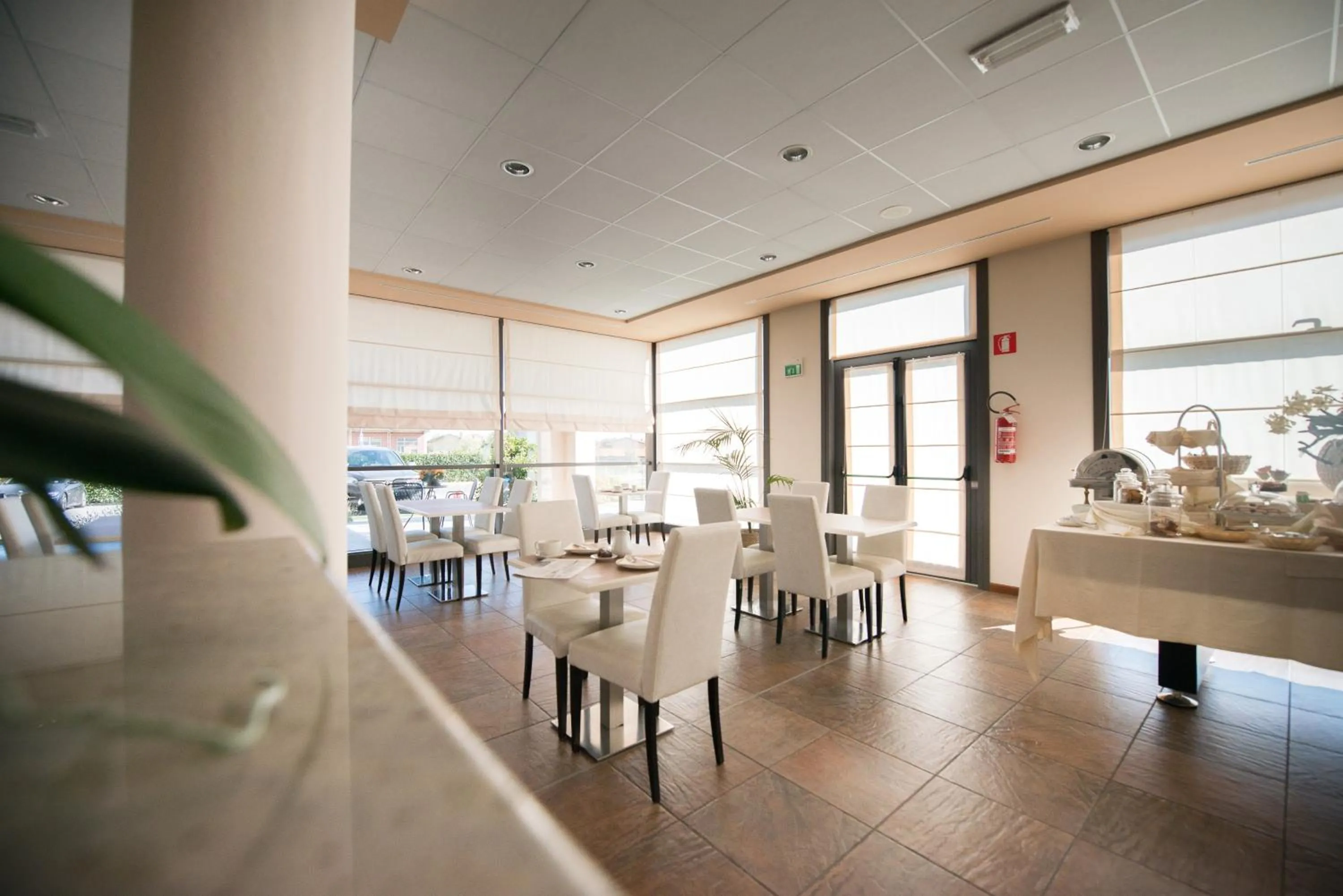 Communal lounge/ TV room in Draconerium Hotel