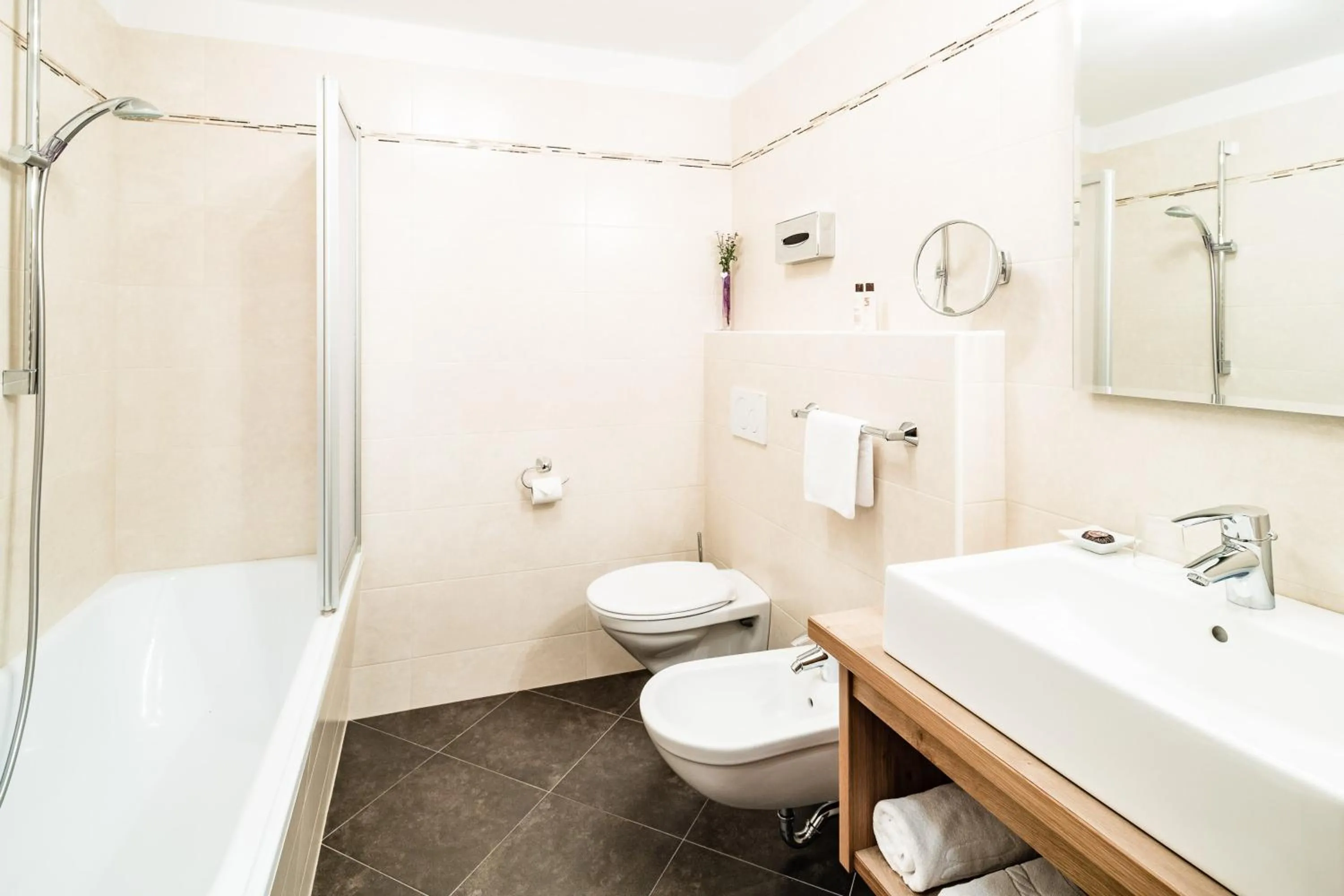 Bathroom in Almhof Hotel Call