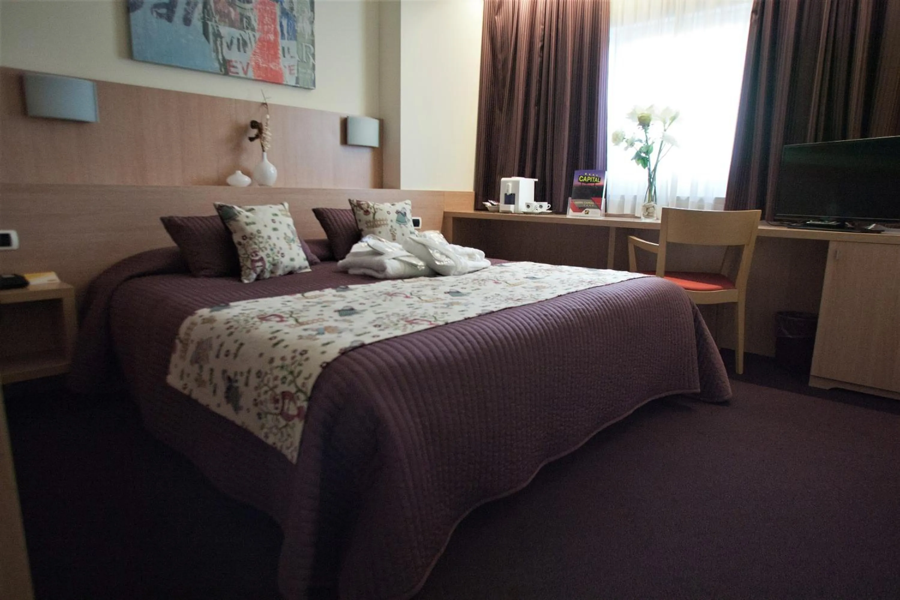 Bed in Hotel Capital