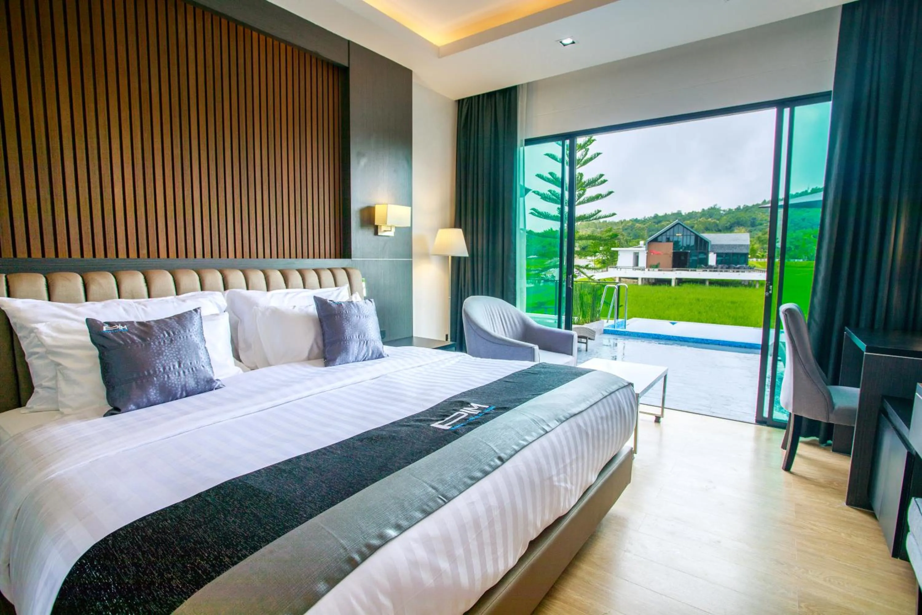 Bed in Pim Pool Villa Nan