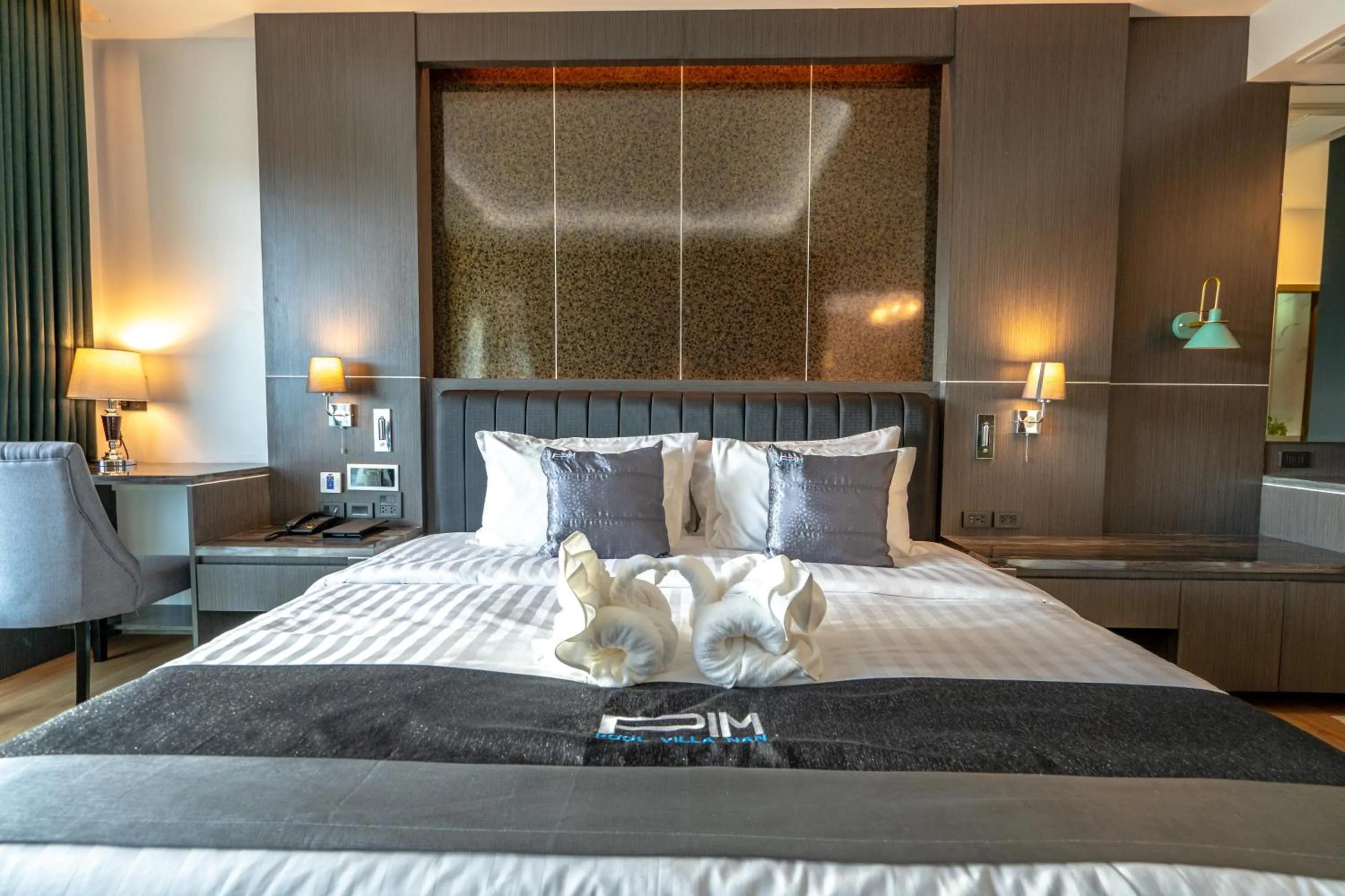 Bed in Pim Pool Villa Nan