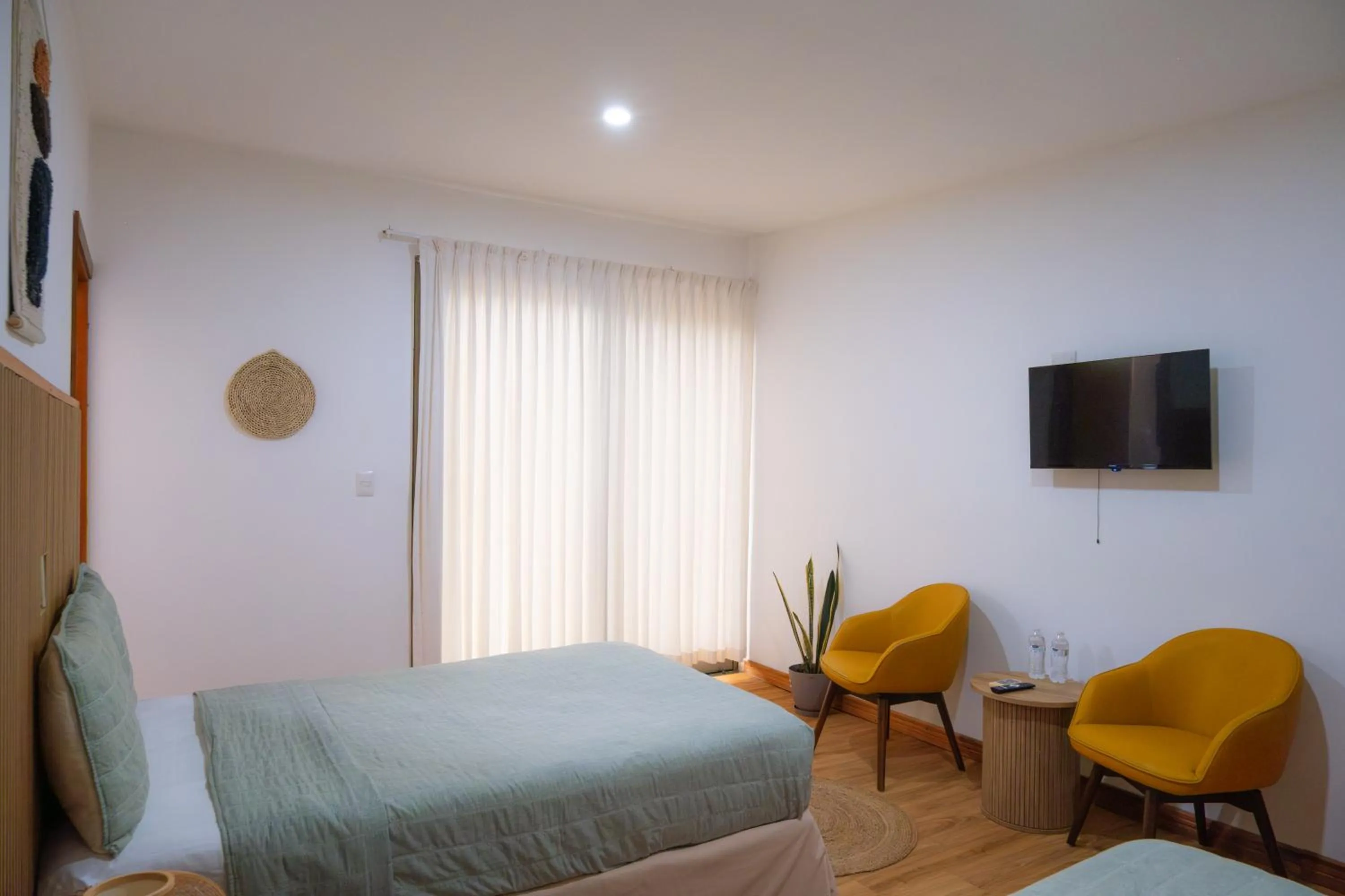 Bedroom, Bed in Equinoccio Hotel