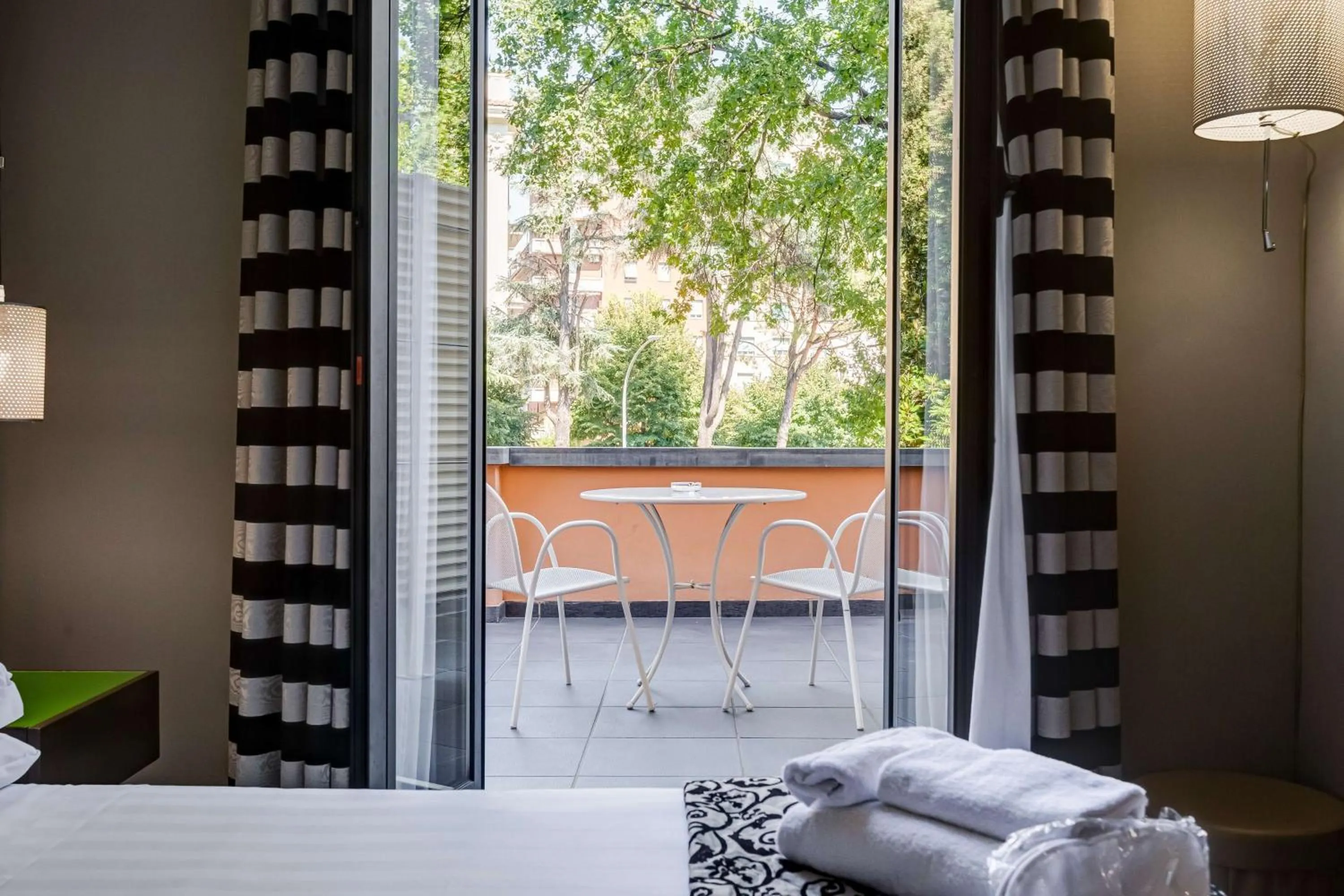 View (from property/room), Bed in Best Western Cinemusic Hotel