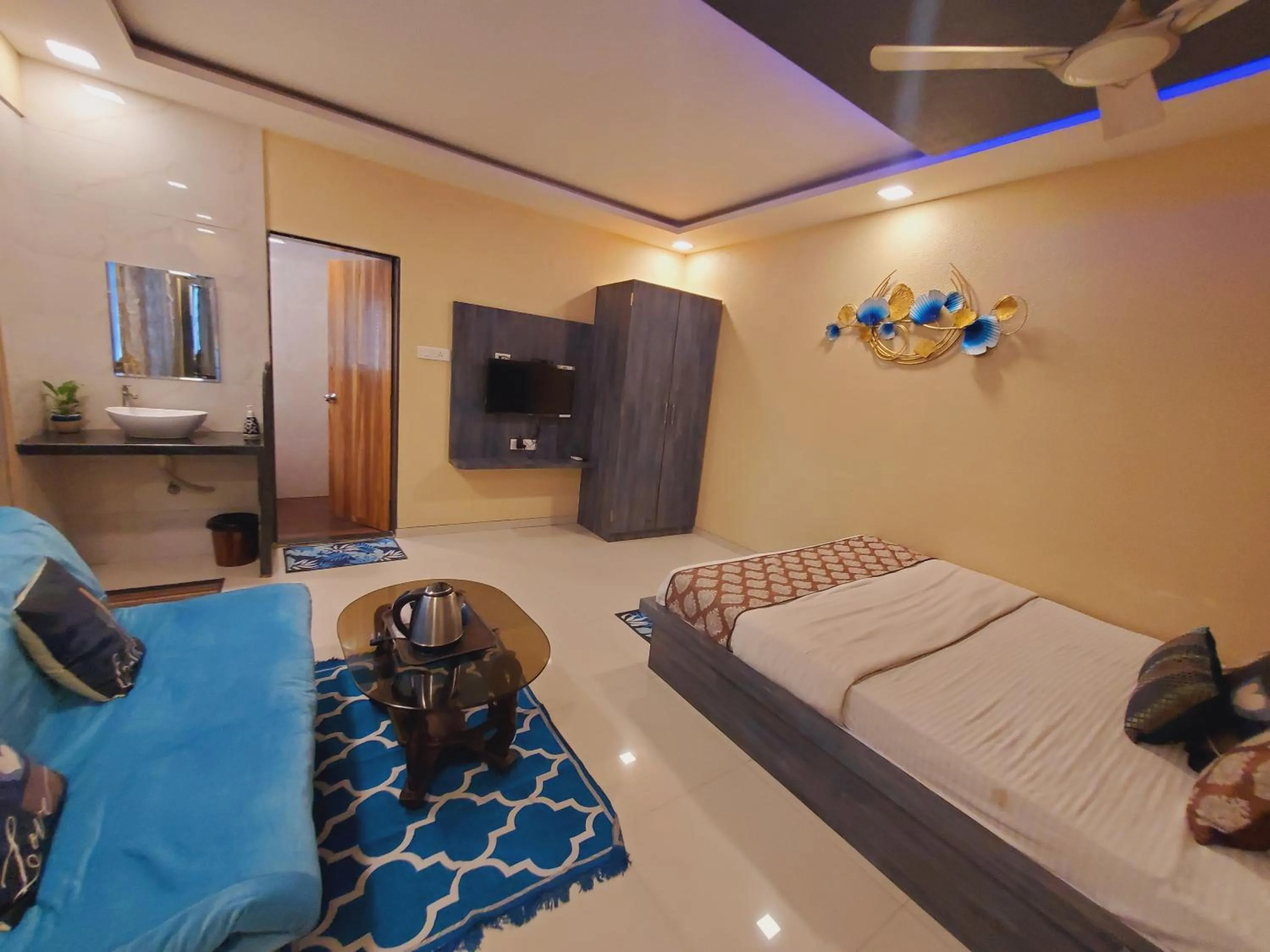 Living room, Bed in Hotel Mari Aai Residency