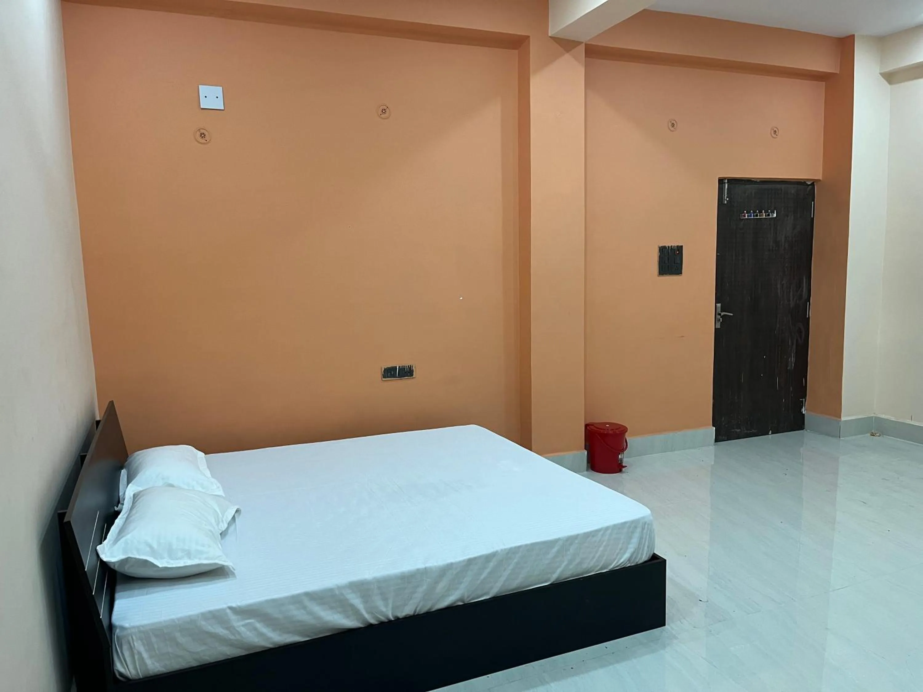 Bed in Hotel Krishna Paradise