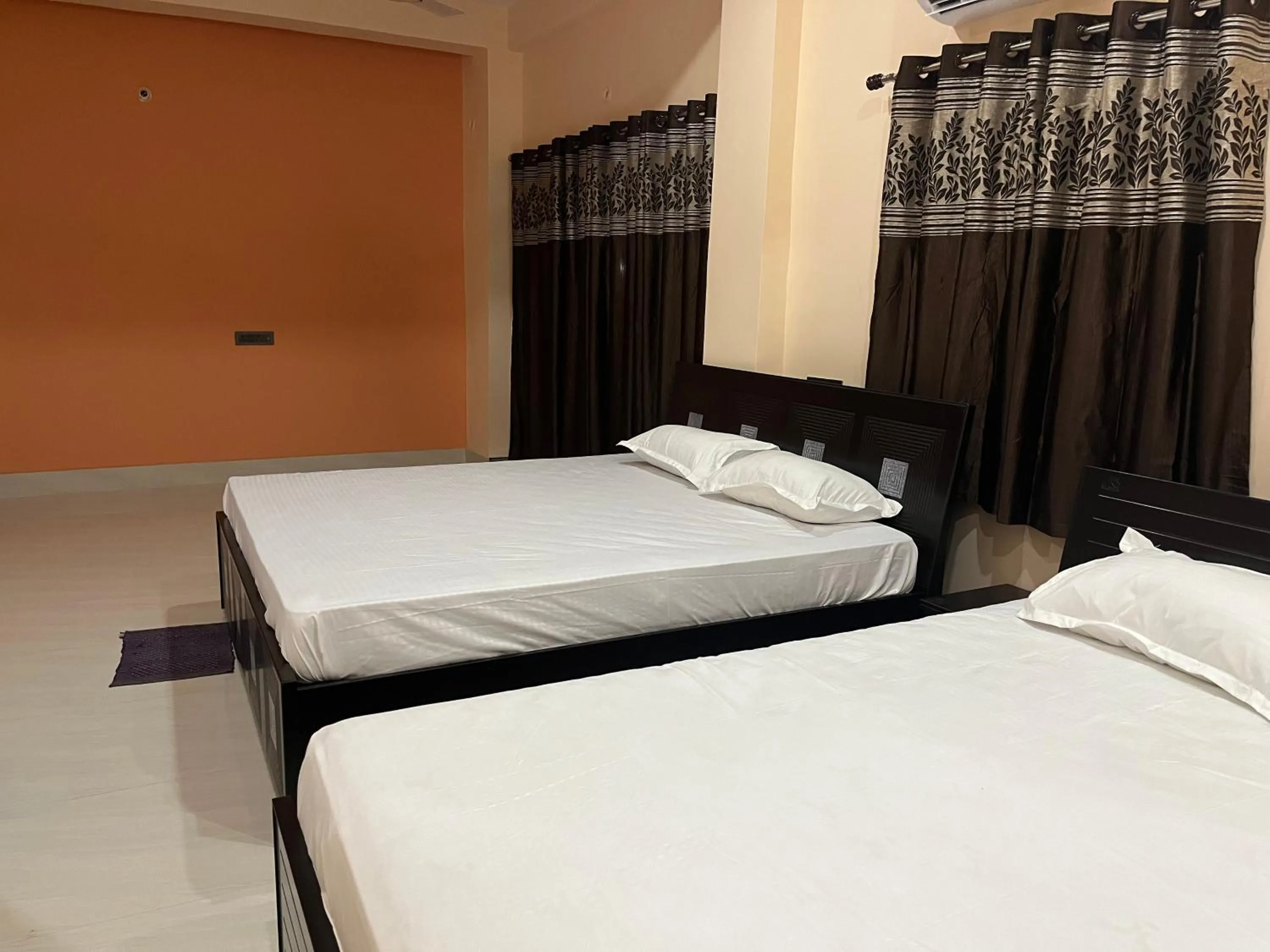 Bed in Hotel Krishna Paradise