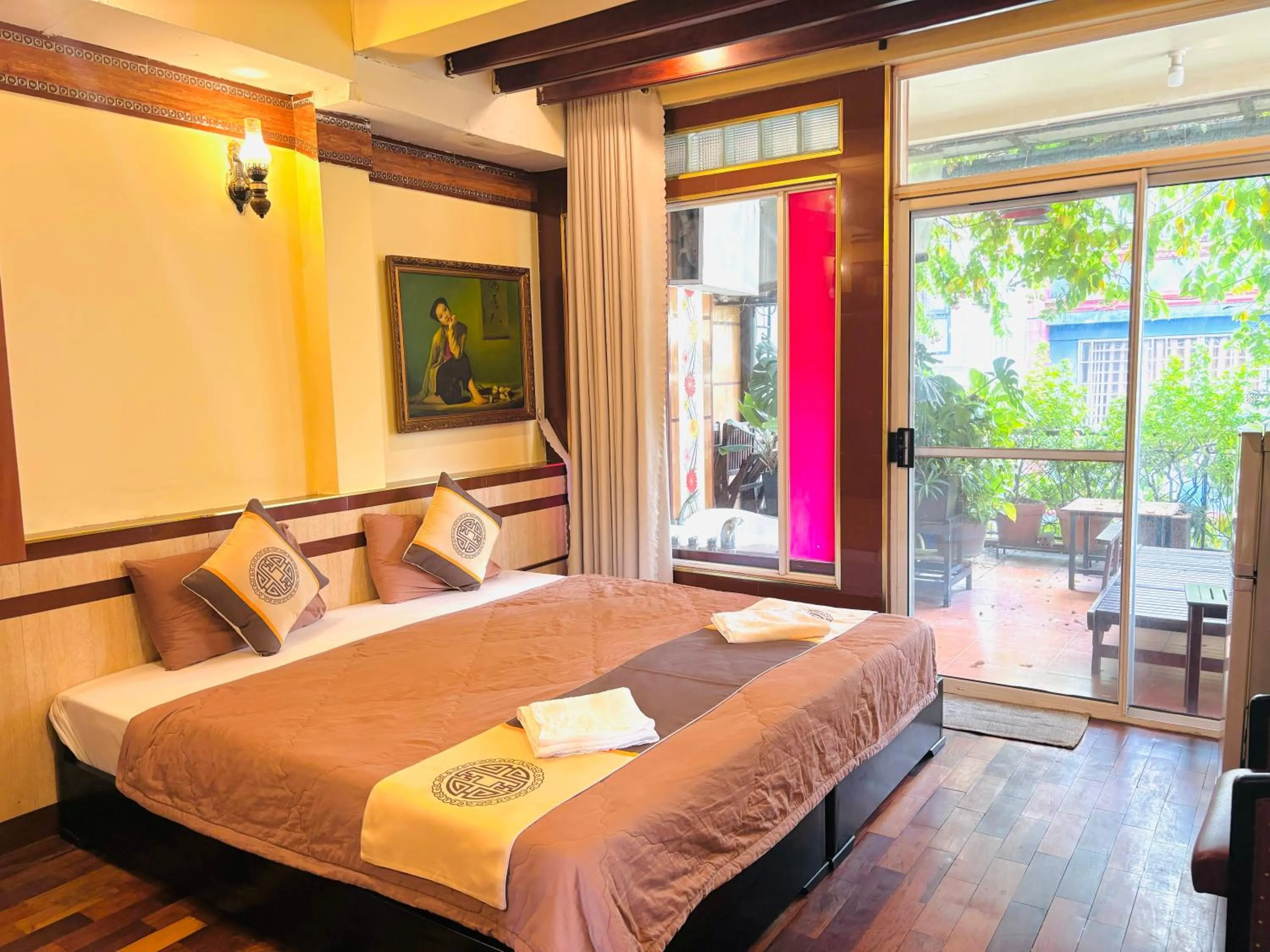 Bed in Bi Saigon Hotel