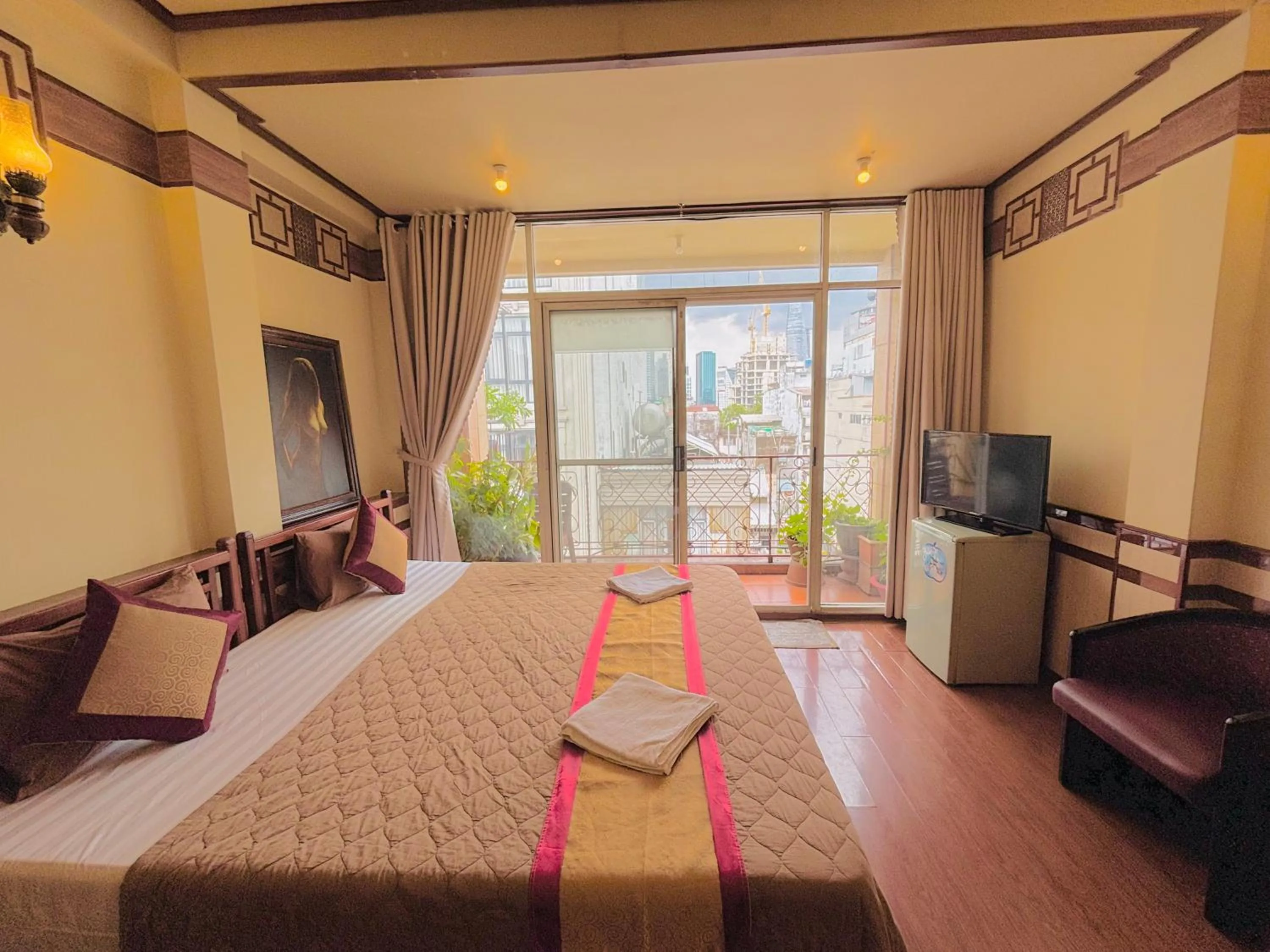 Bed in Bi Saigon Hotel