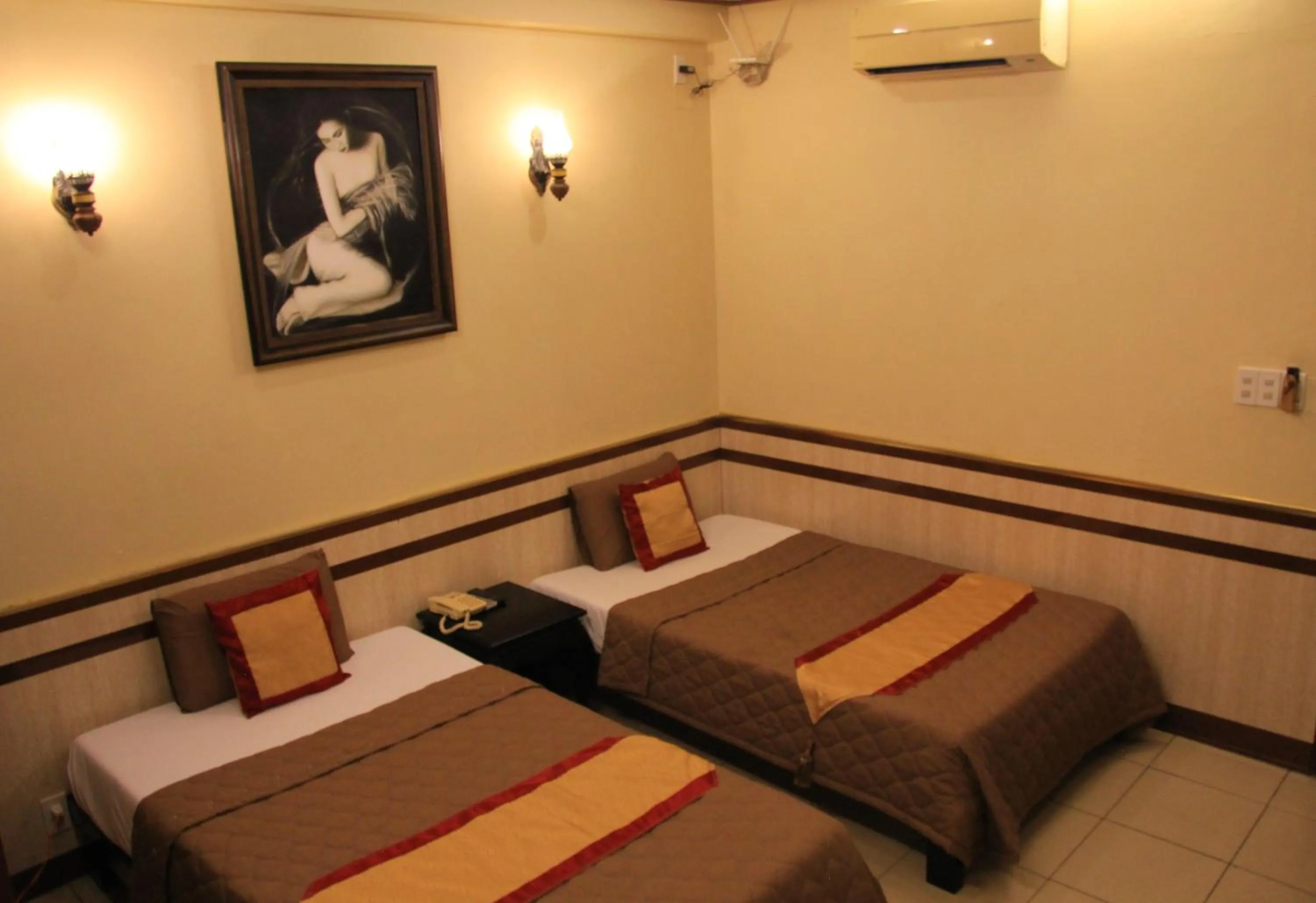 Bed in Bi Saigon Hotel