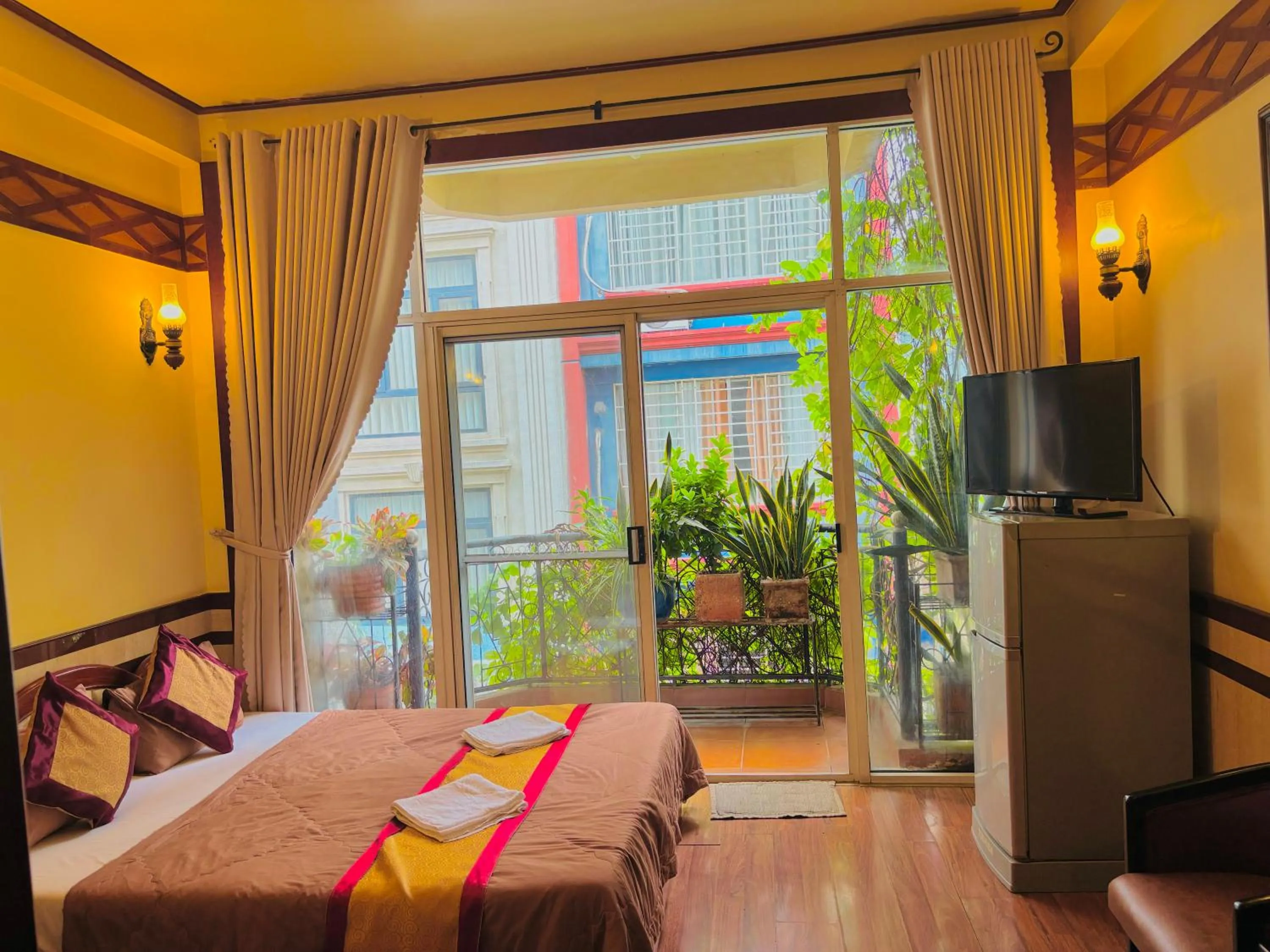 Bed in Bi Saigon Hotel