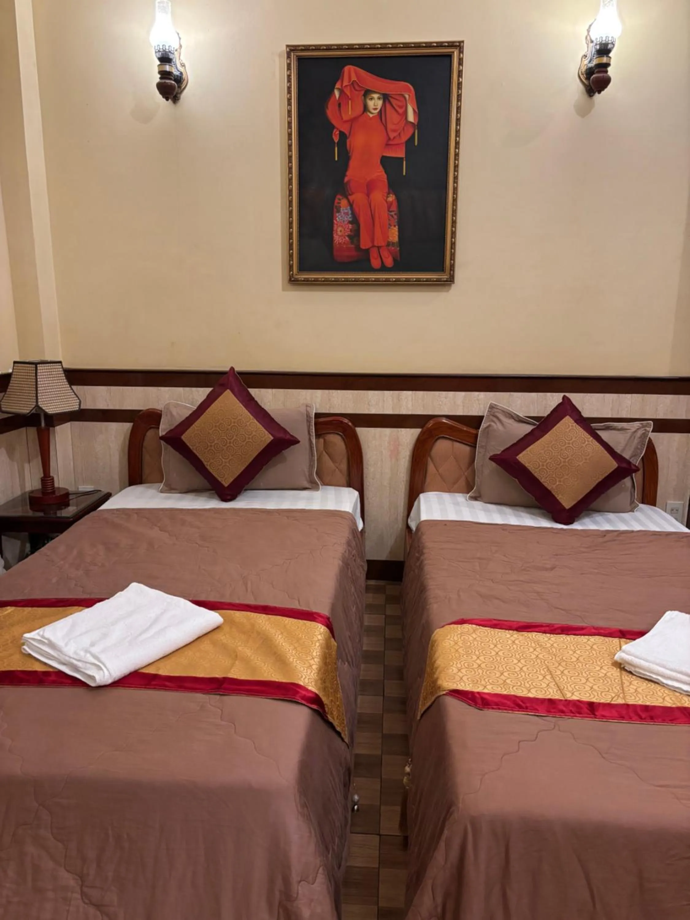 Bed in Bi Saigon Hotel