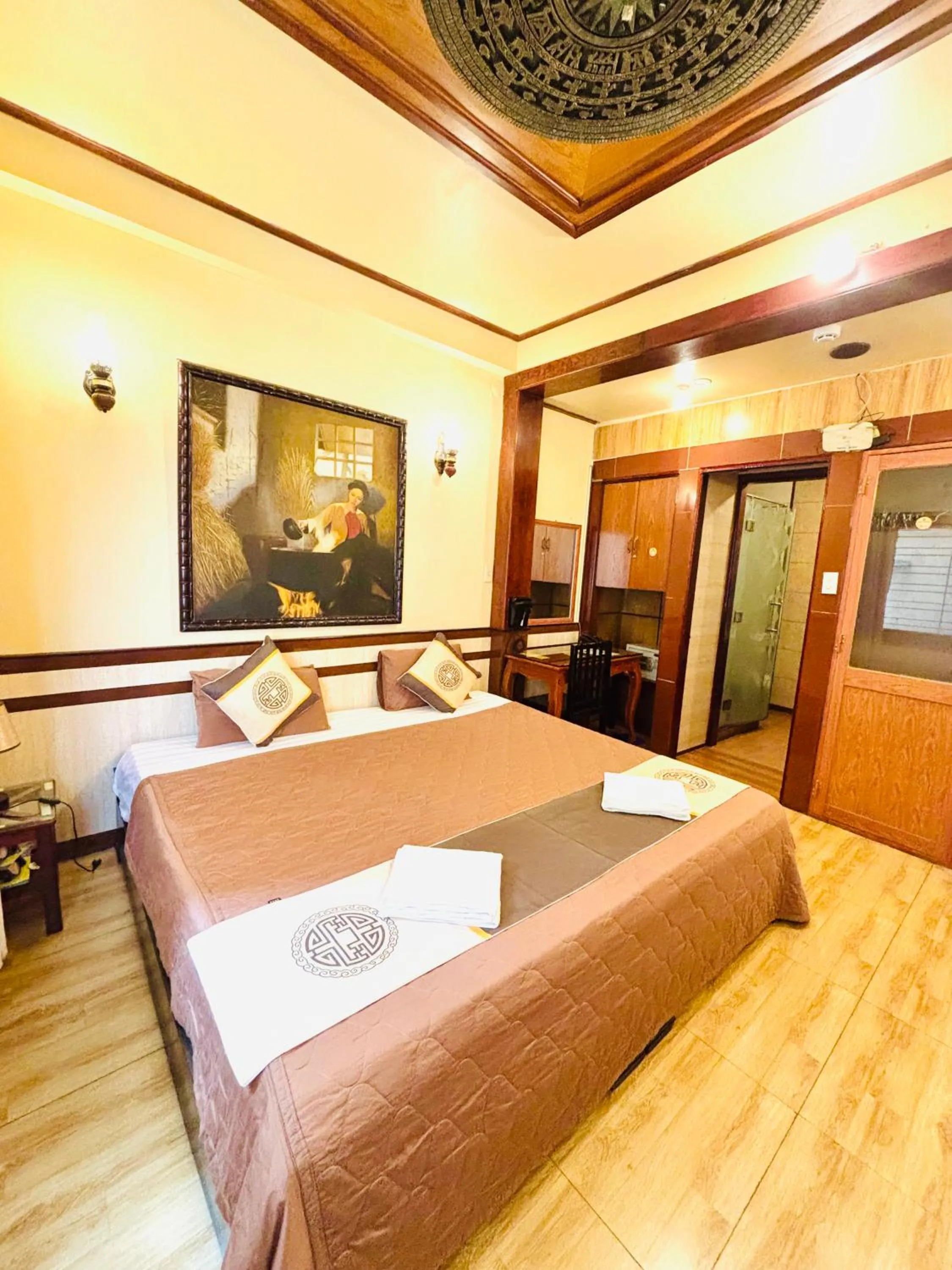 Bed in Bi Saigon Hotel