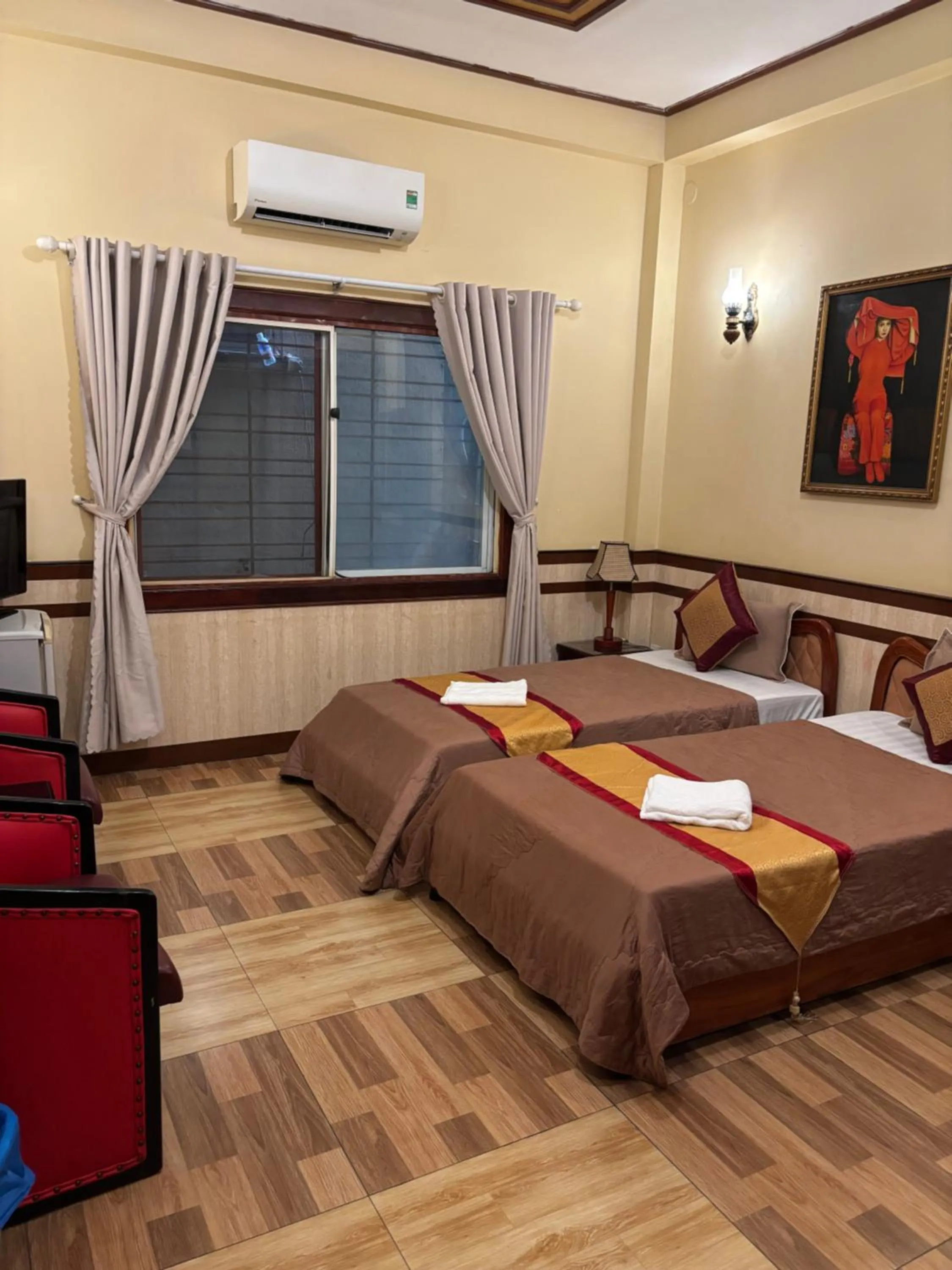 Bed in Bi Saigon Hotel