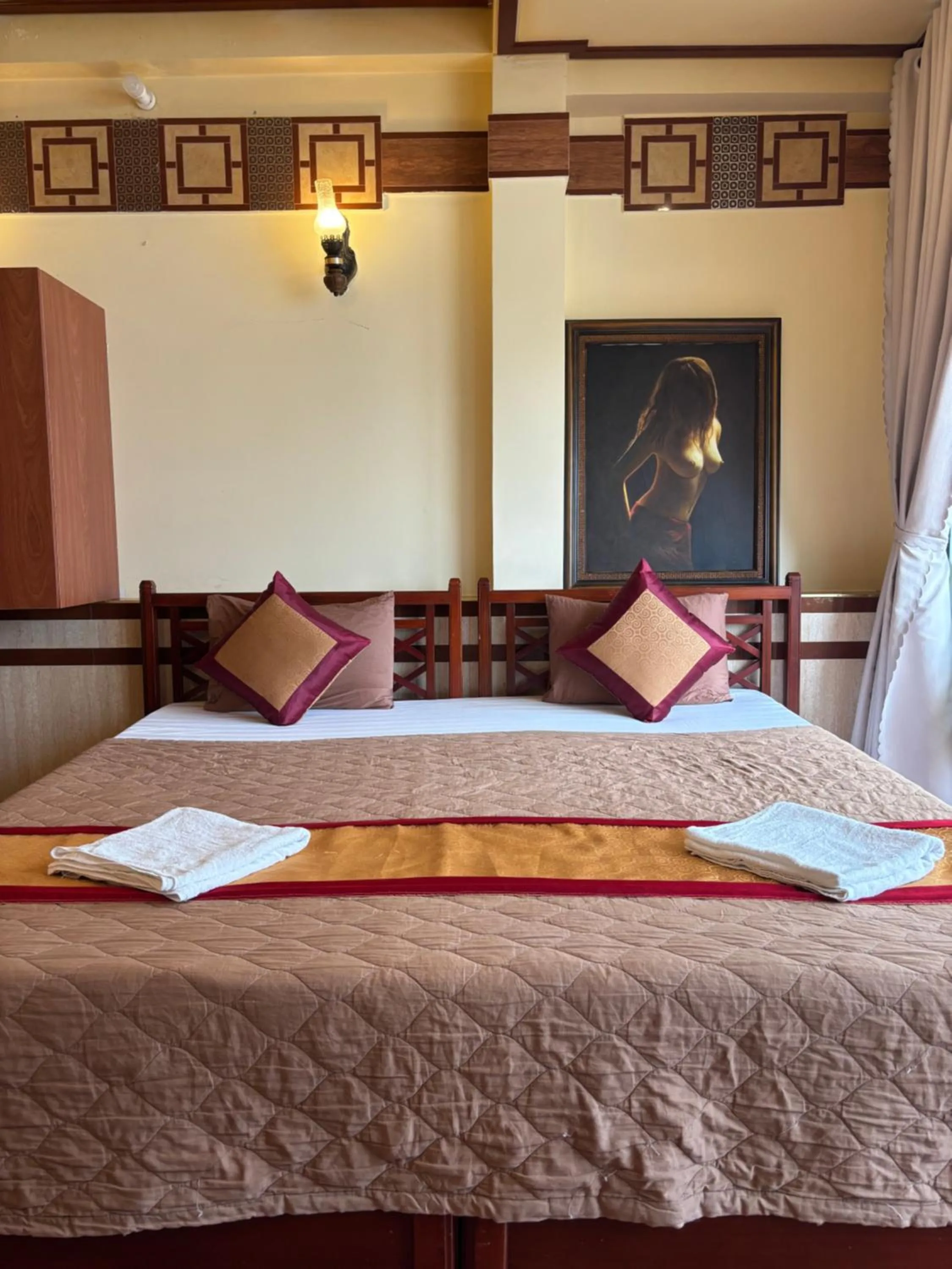 Bed in Bi Saigon Hotel