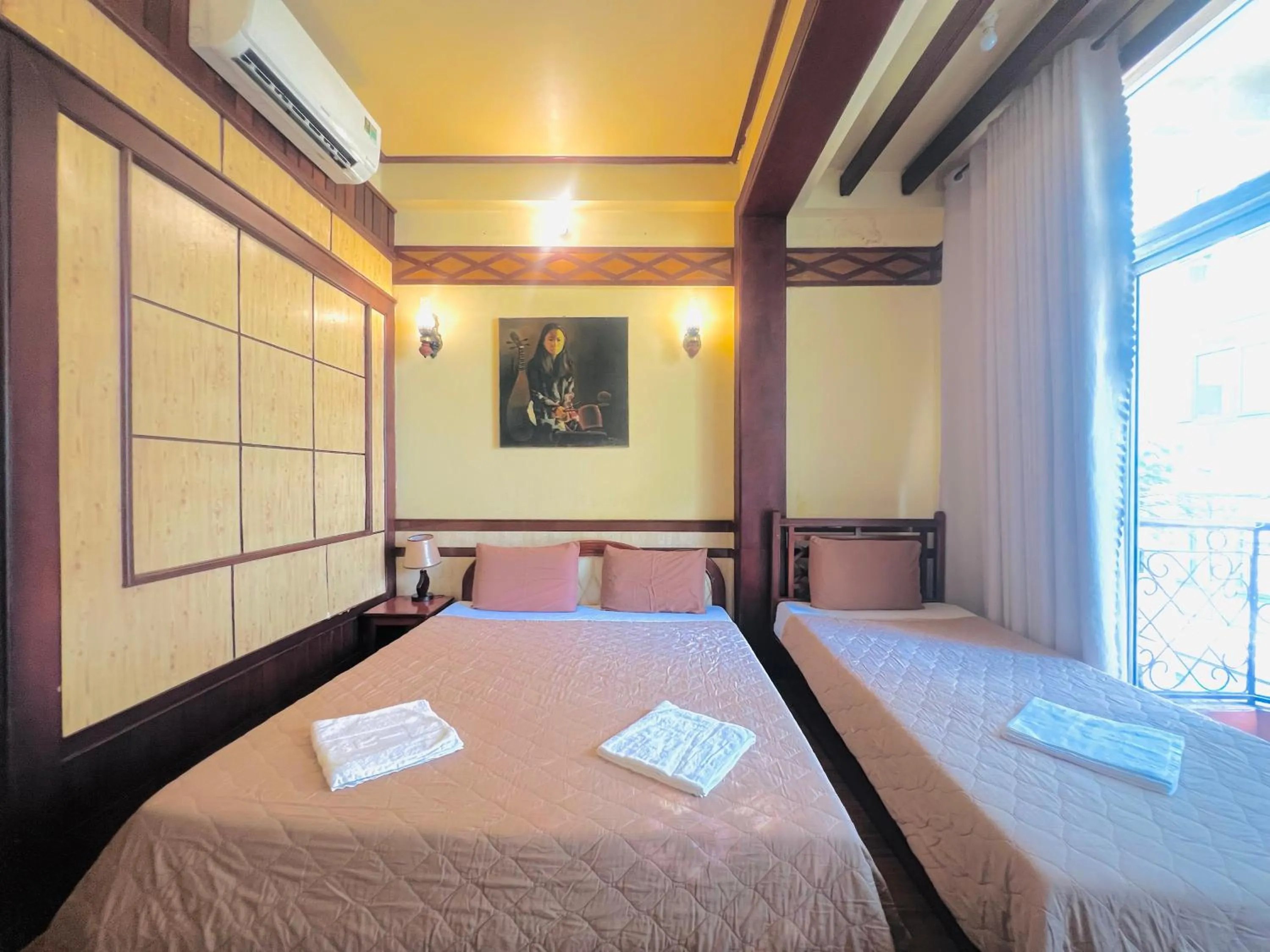 Bed in Bi Saigon Hotel