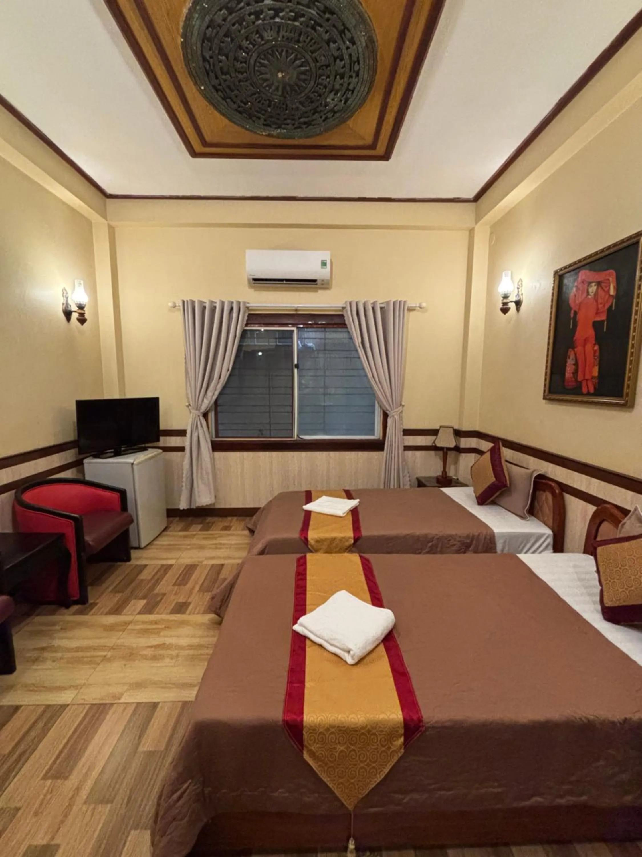 Bed in Bi Saigon Hotel