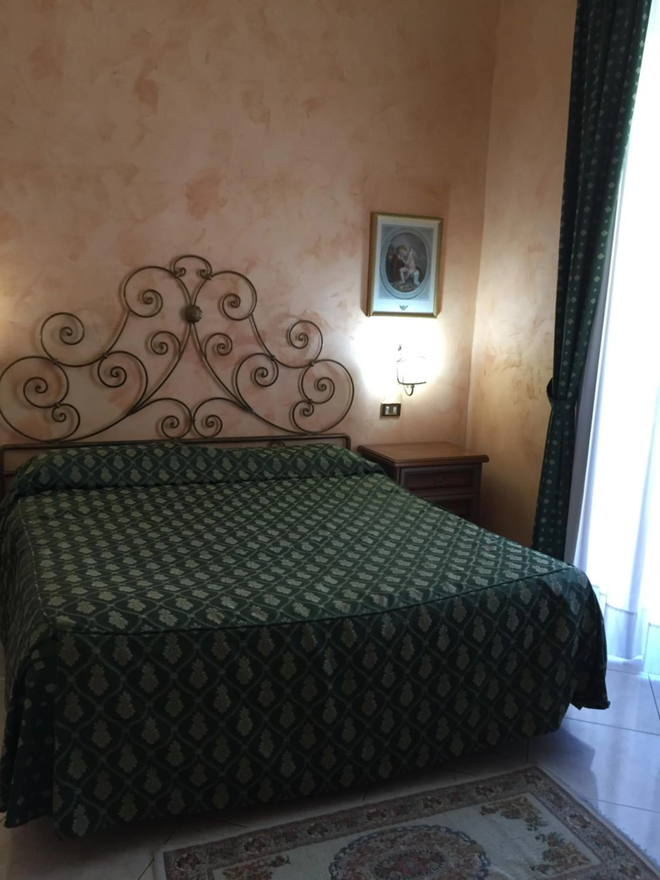 Decorative detail, Bed in Hotel Centrale Europa