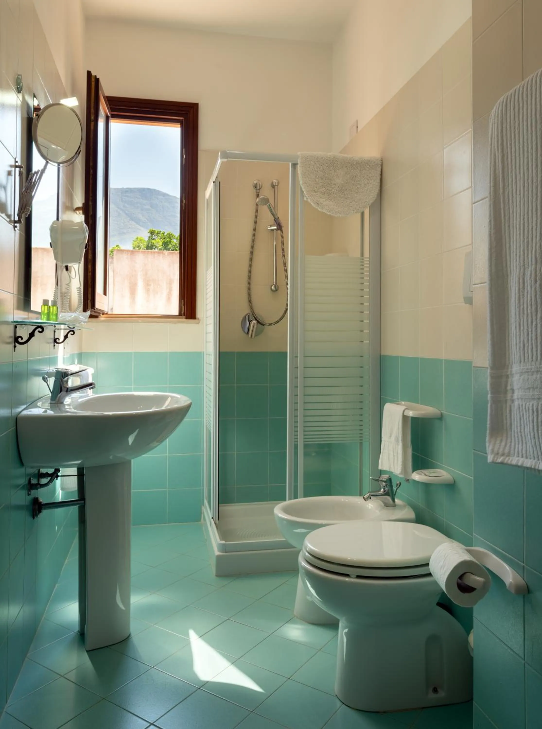 Bathroom in Hotel Achibea