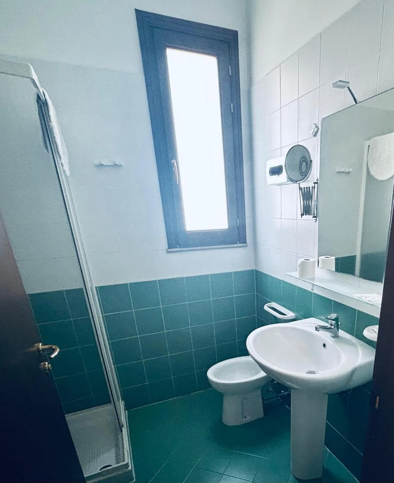 Bathroom in Hotel Achibea