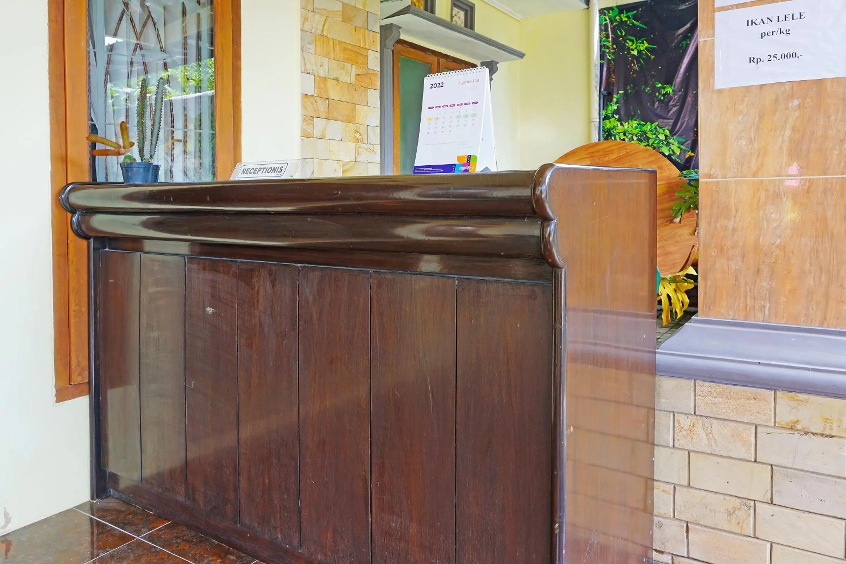 Lobby or reception in Hotel O Trisna Srabah Resort Homestay & Resto