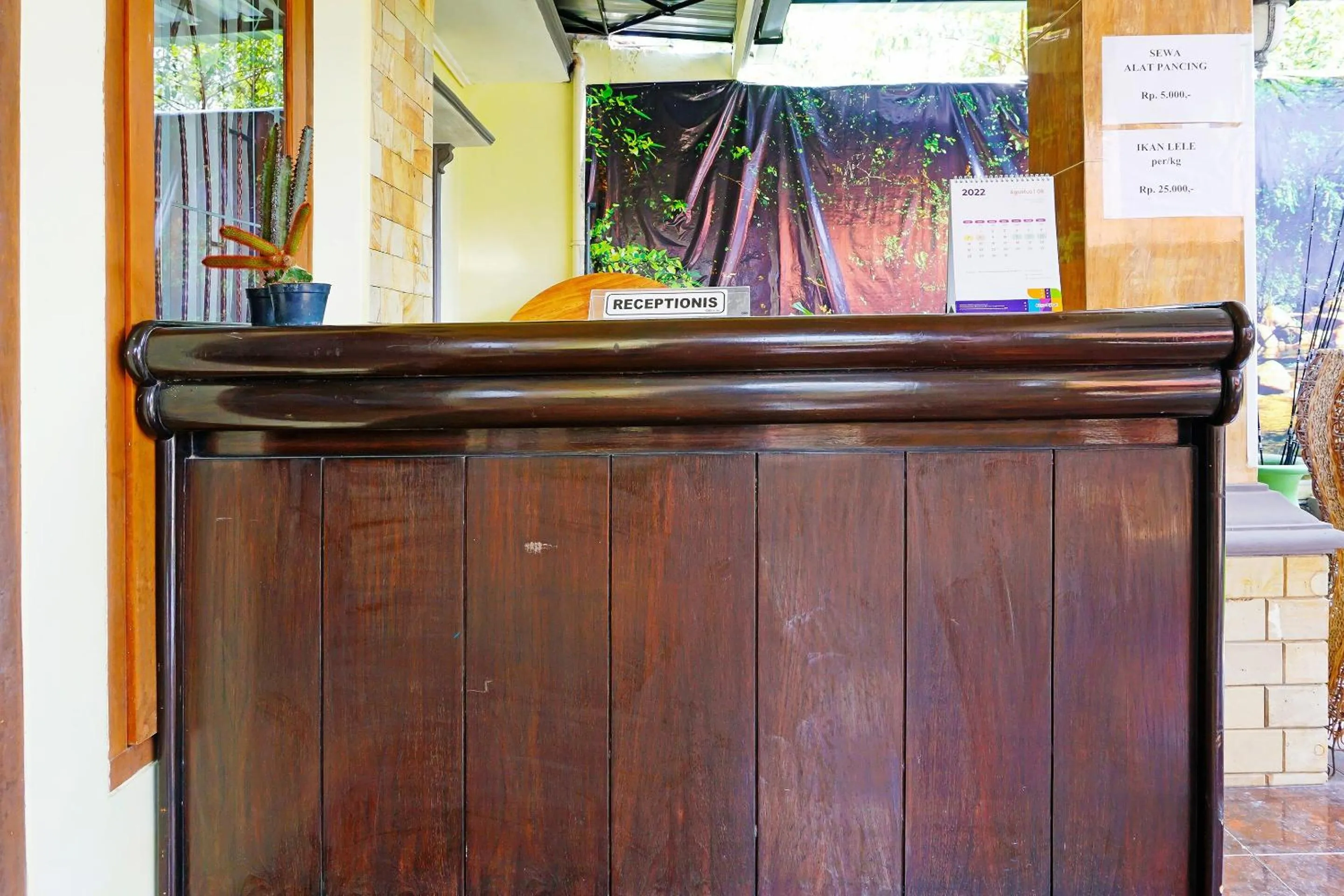 Lobby or reception in Hotel O Trisna Srabah Resort Homestay & Resto