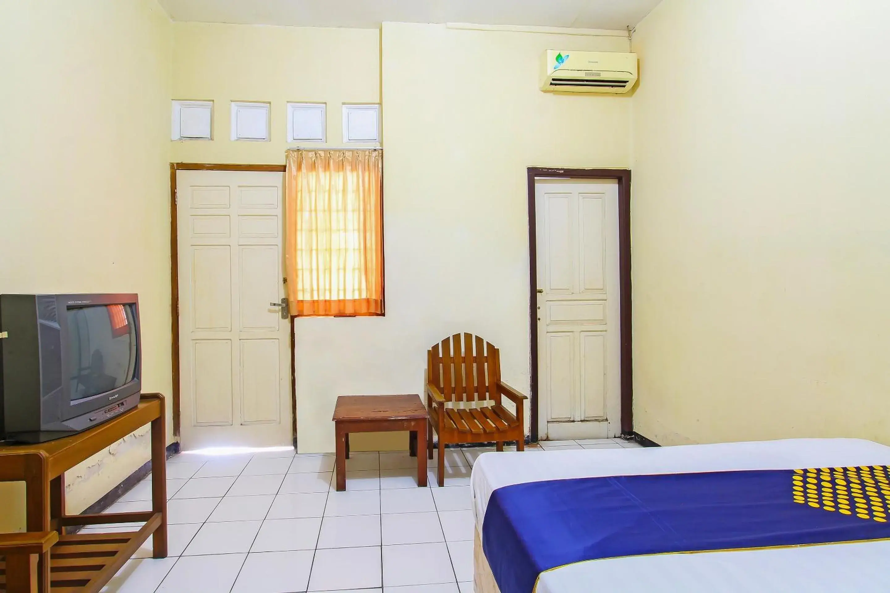 Bedroom in Hotel O Meilias Bedroom in Hotel O Meilias