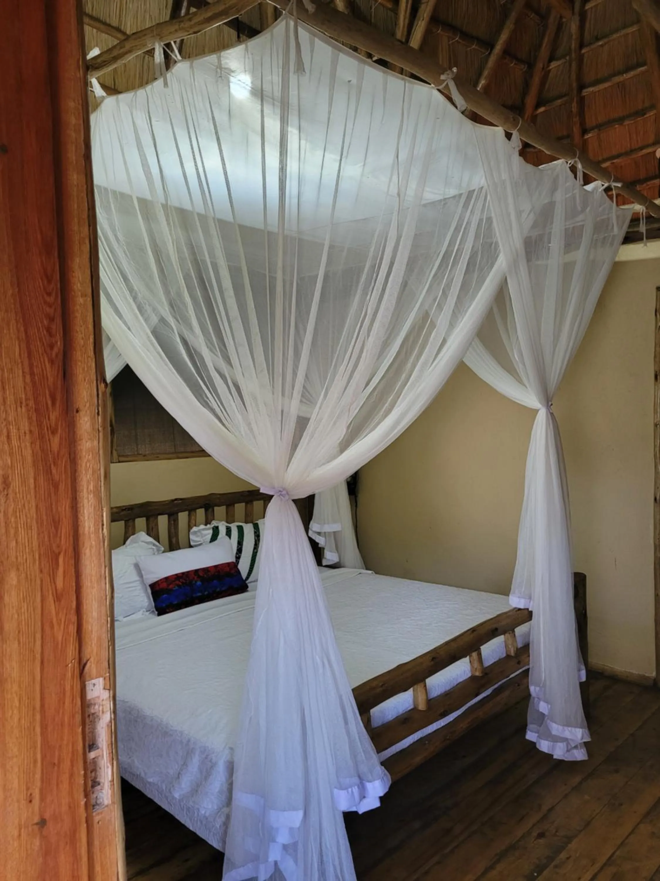 Bed in Songbird Safari Lodge & Campsite