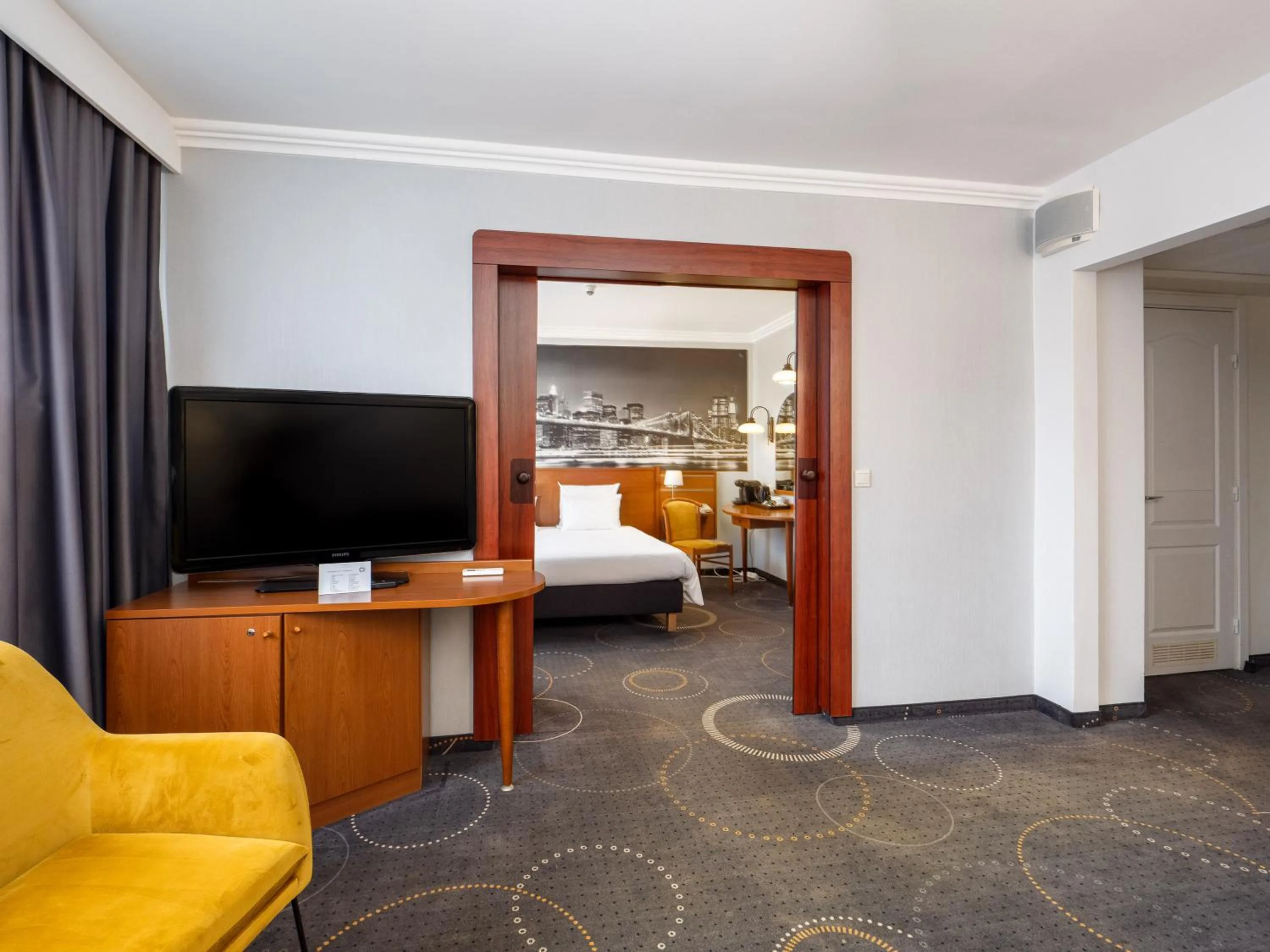 Living room, Bed in Mercure Czestochowa Centrum