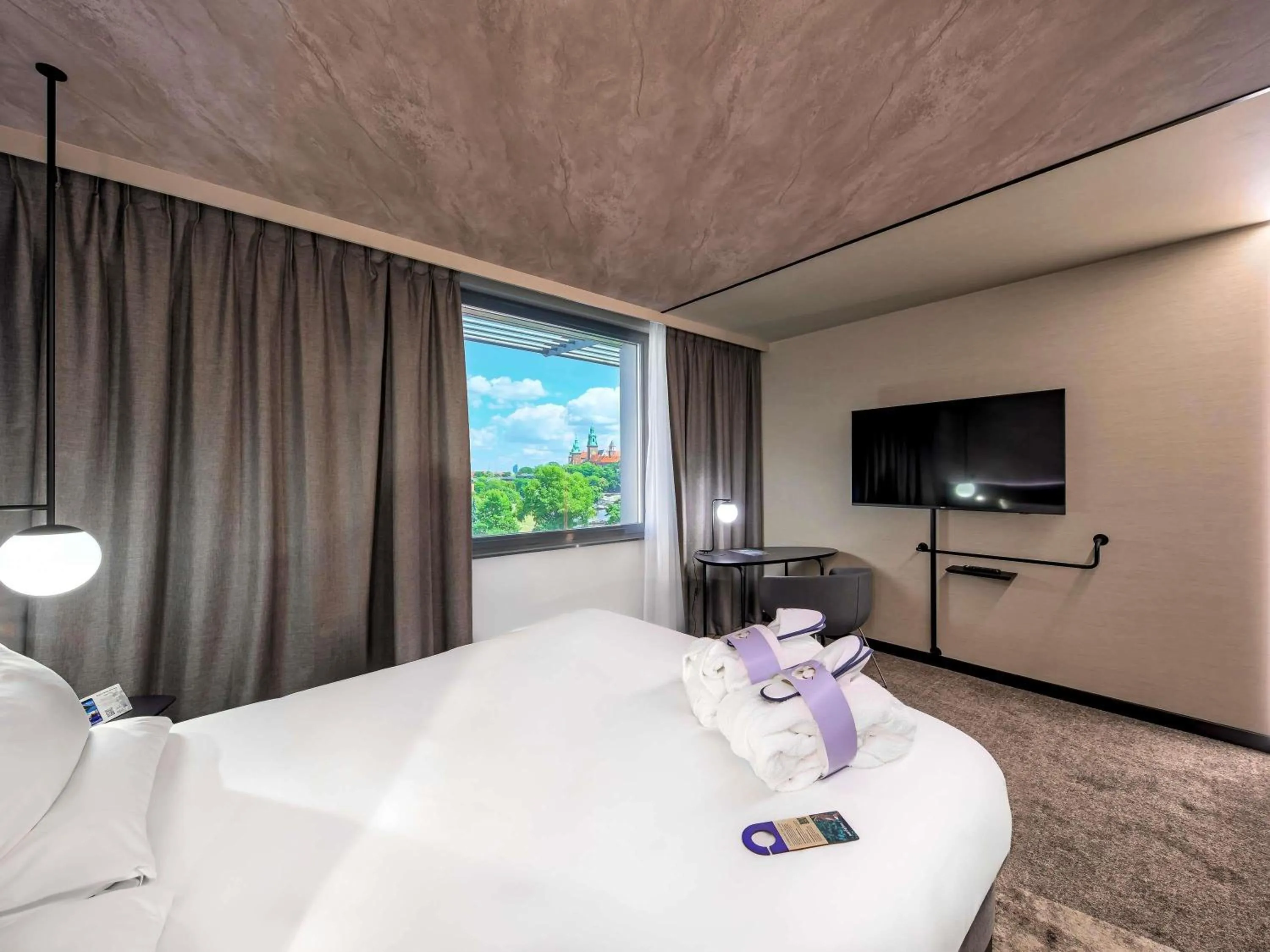 Photo of the whole room, Bed in Novotel Kraków Centrum