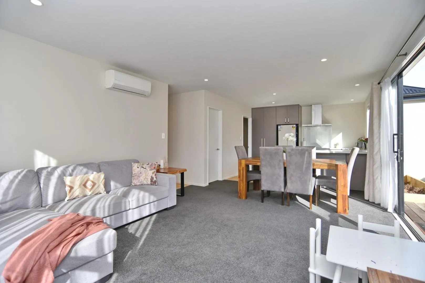 Living room in Thomas Townhouse - Christchurch Holiday Homes