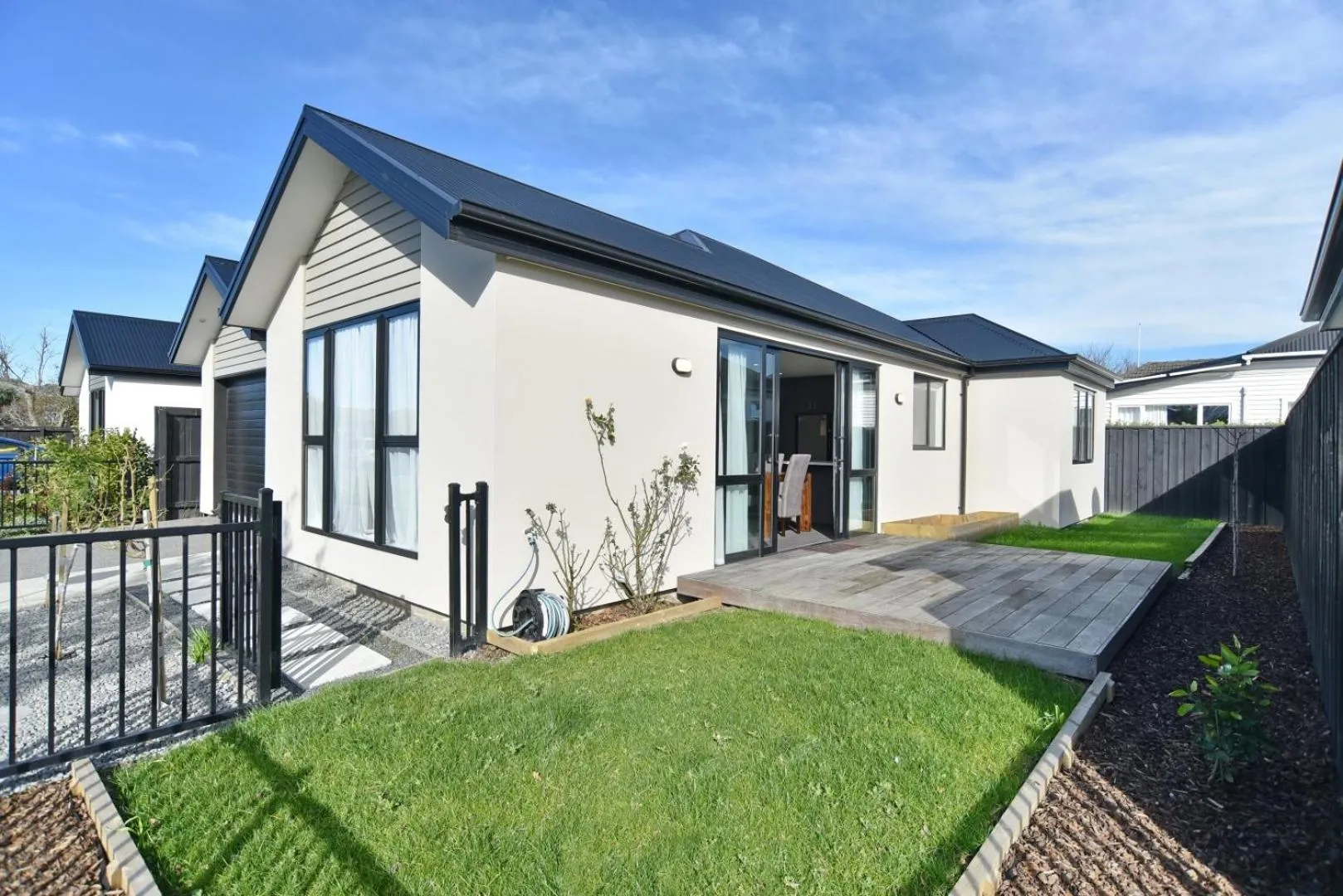 Property building in Thomas Townhouse - Christchurch Holiday Homes