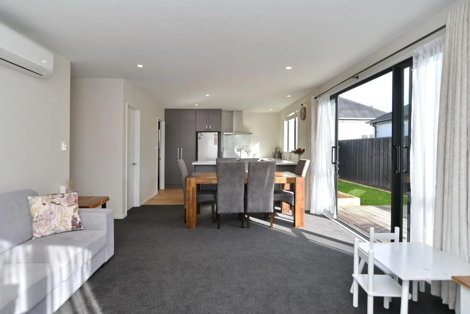 Living room in Thomas Townhouse - Christchurch Holiday Homes