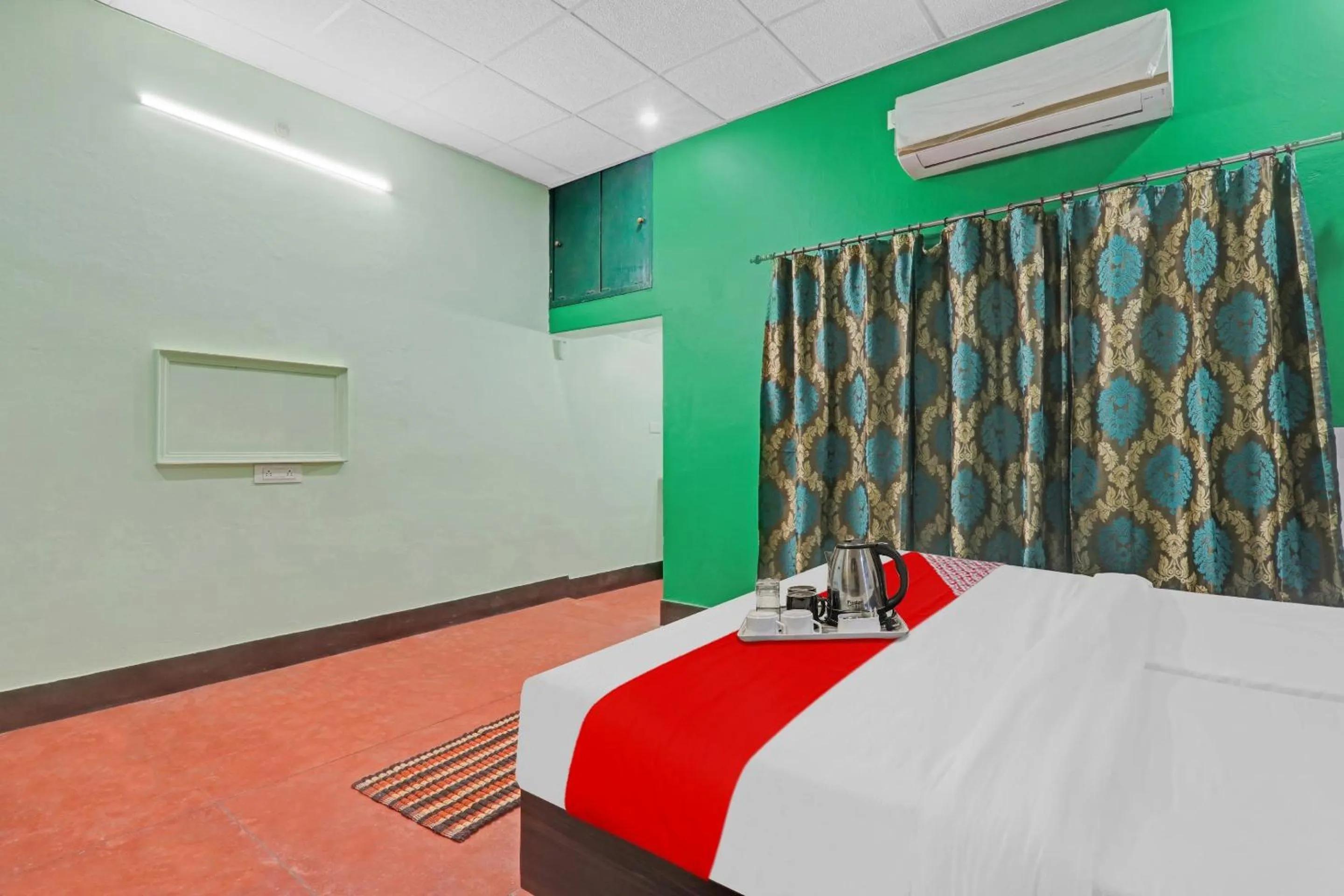 Bedroom in Hotel O Surbhi G House