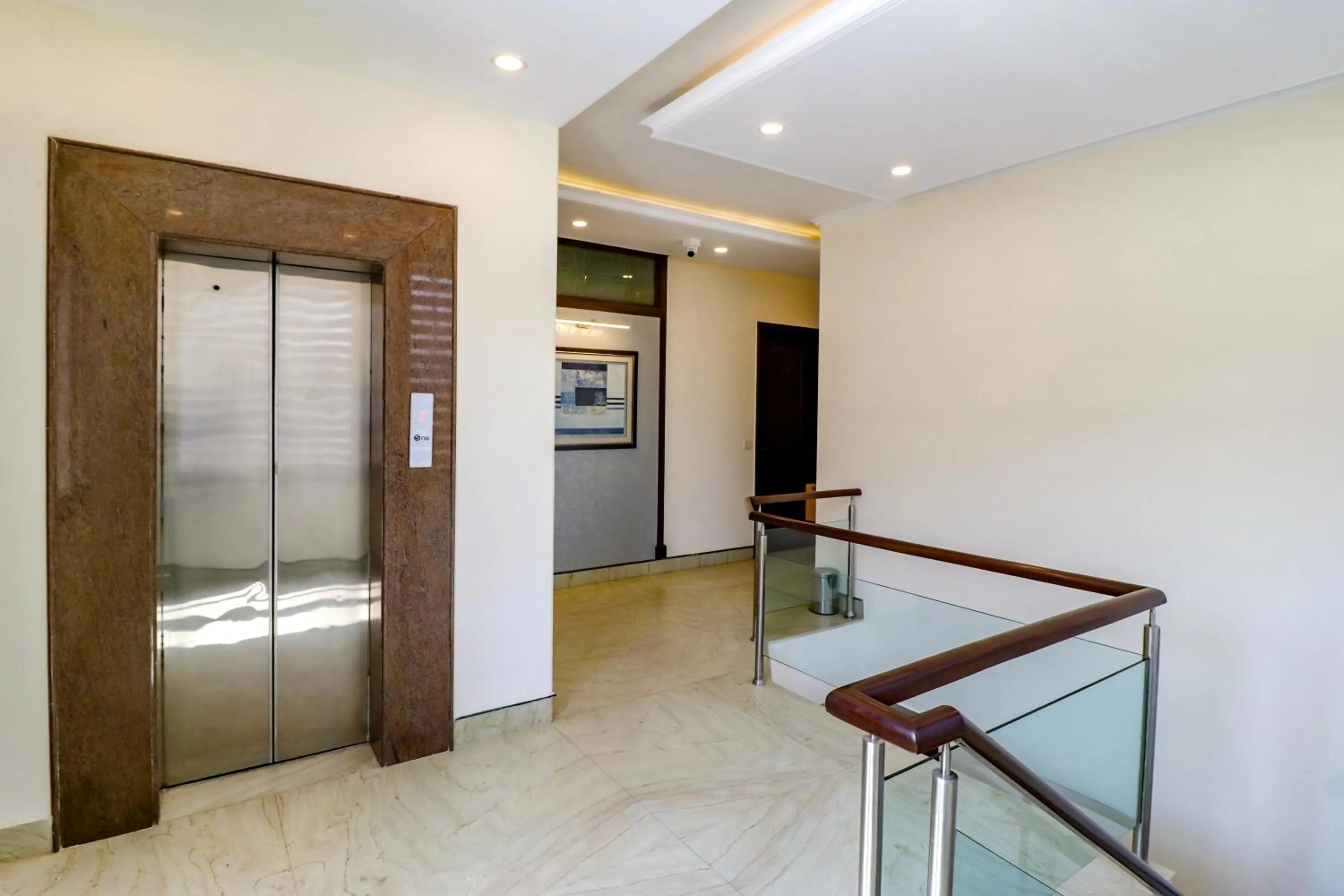 elevator in FabHotel RR Residency - DLF Cyber City, Gurugram