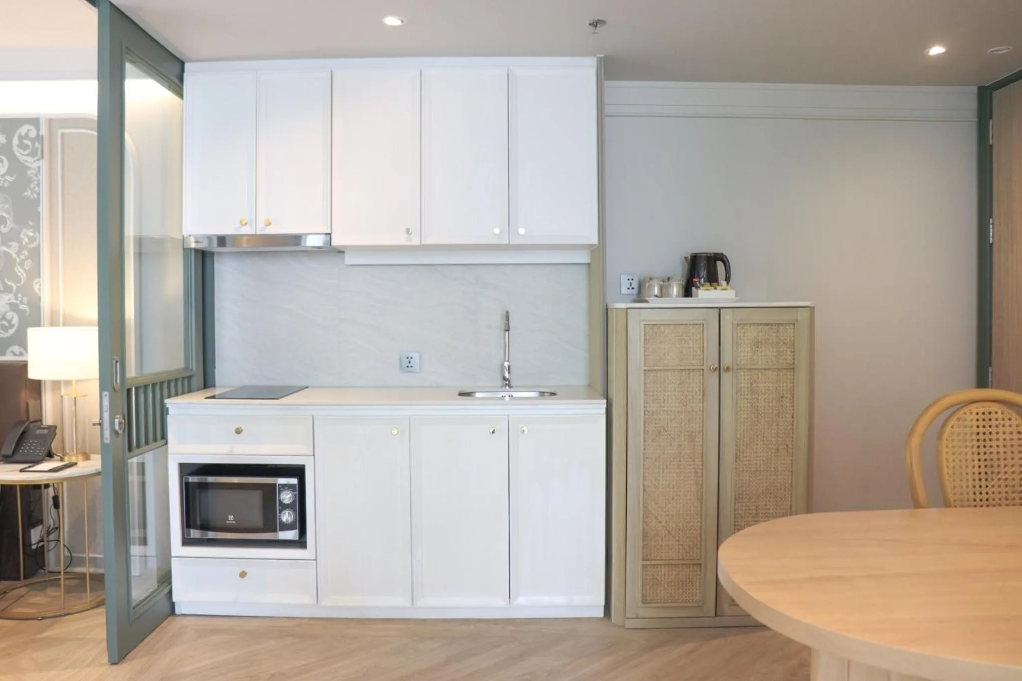 Kitchen or kitchenette in The Quarter Chaophraya by UHG