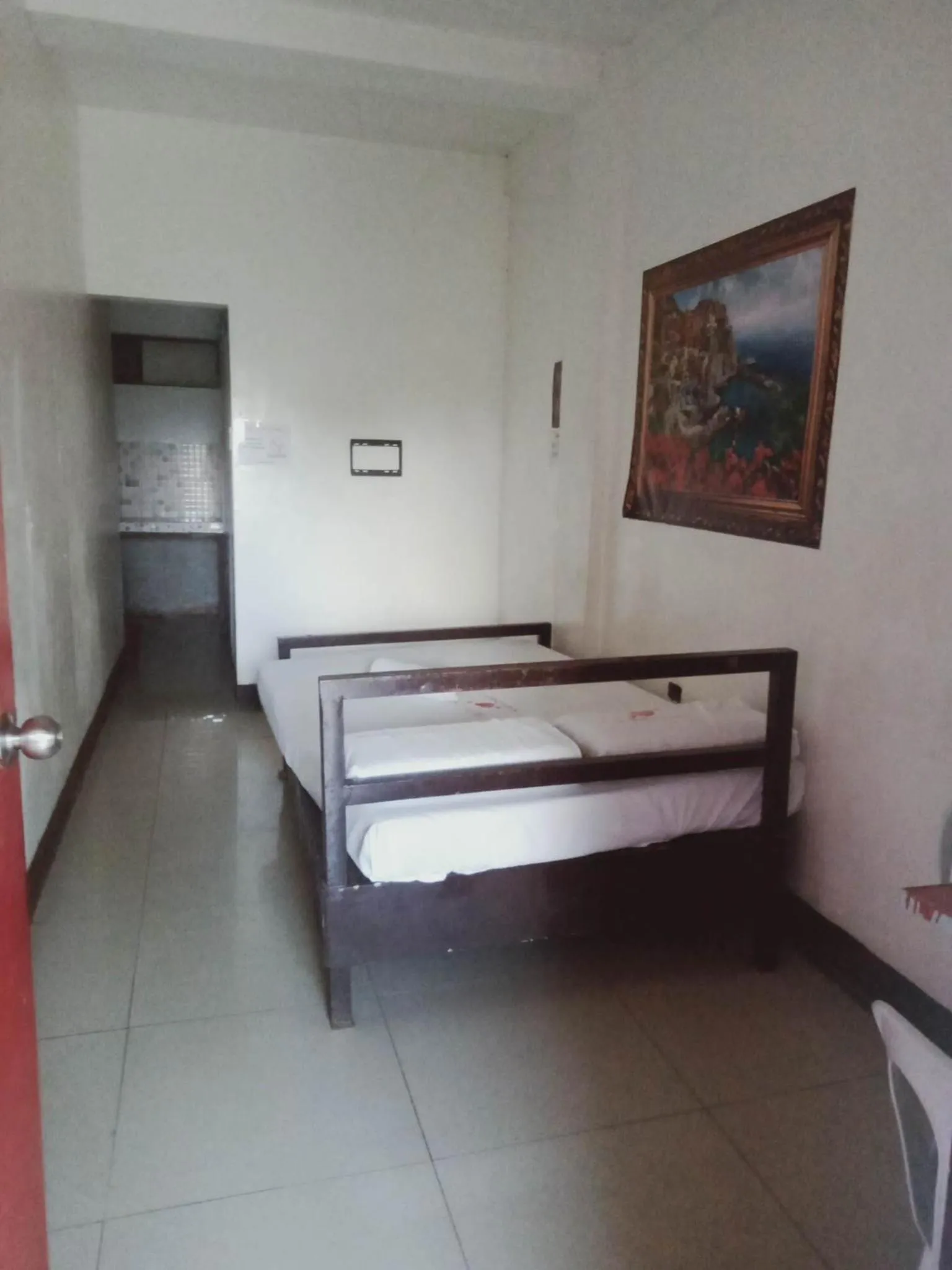 Bed in WJV INN Marigondon