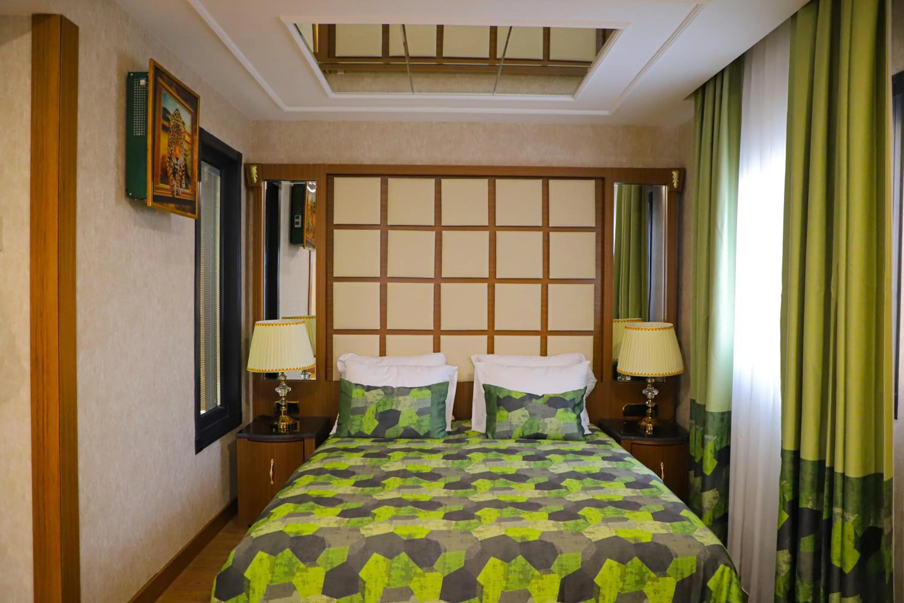 Bed in UNITED HOTEL INTERNATIONAL