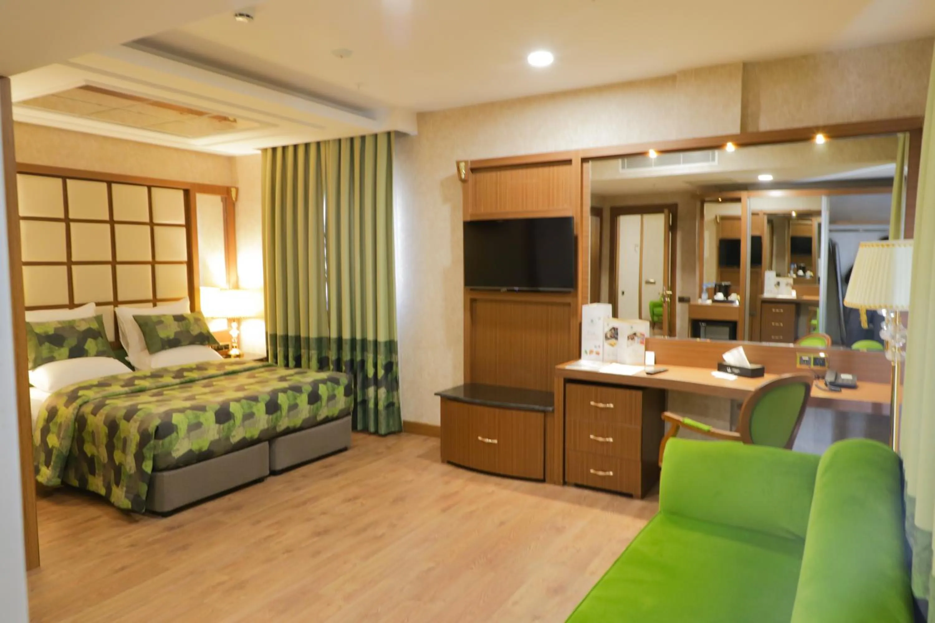 Bed in UNITED HOTEL INTERNATIONAL