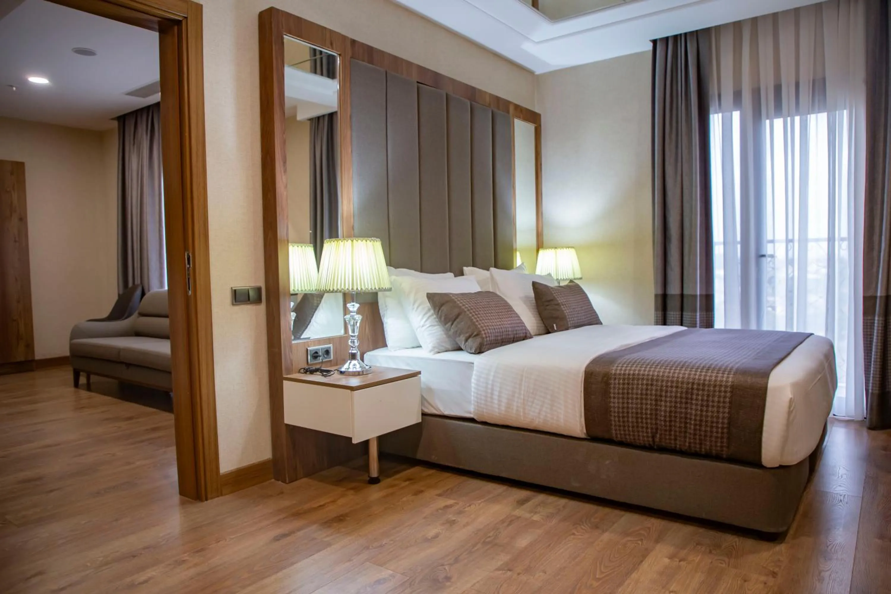 Coffee/tea facilities, Bed in UNITED HOTEL INTERNATIONAL