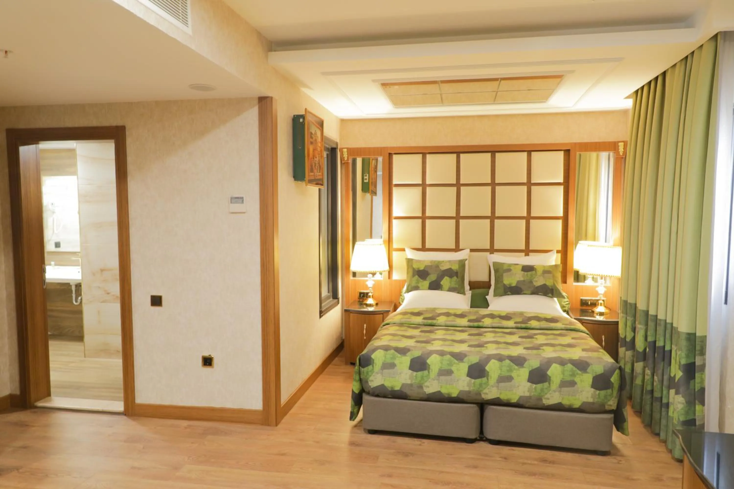 Bed in UNITED HOTEL INTERNATIONAL