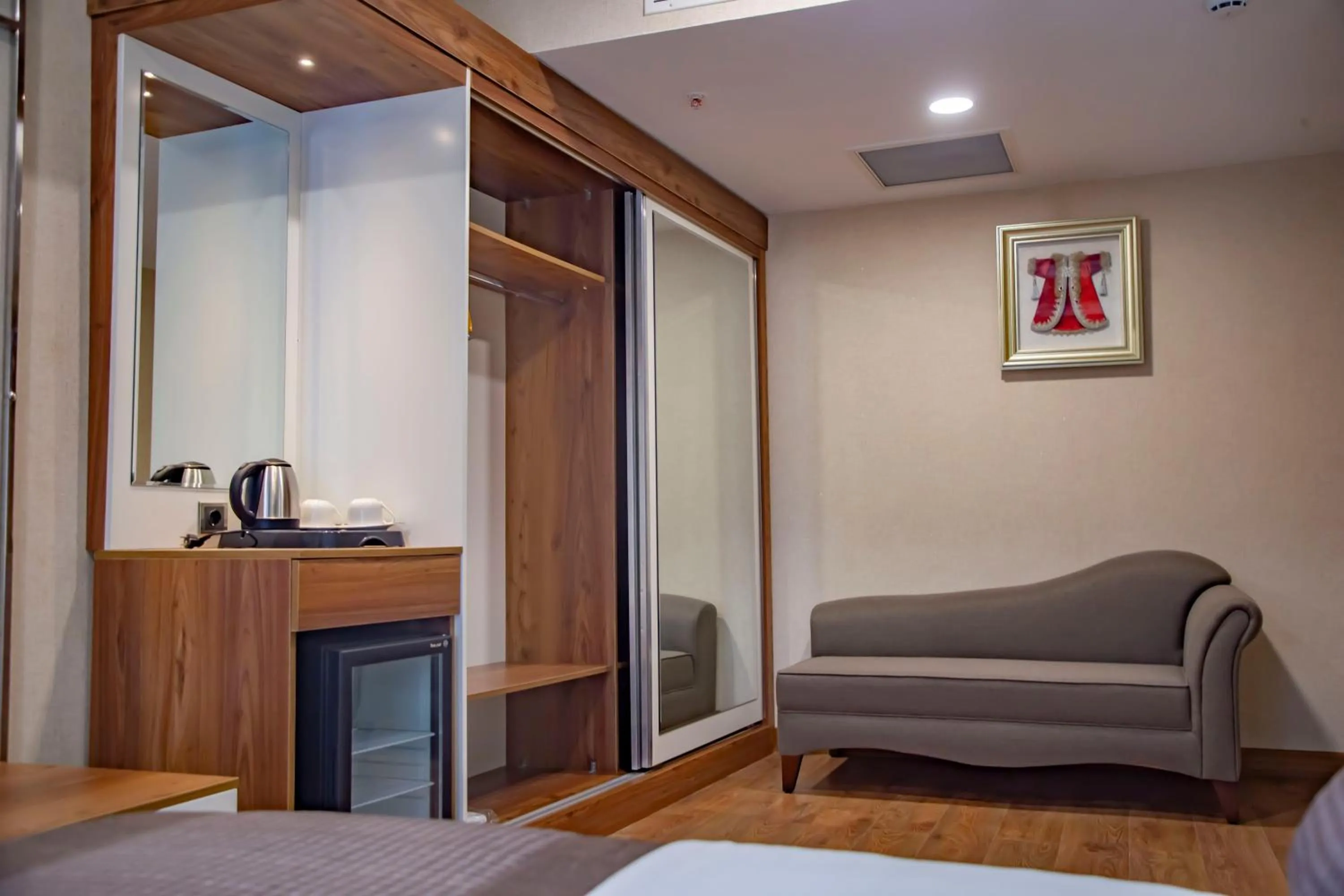 Seating area, Bed in UNITED HOTEL INTERNATIONAL