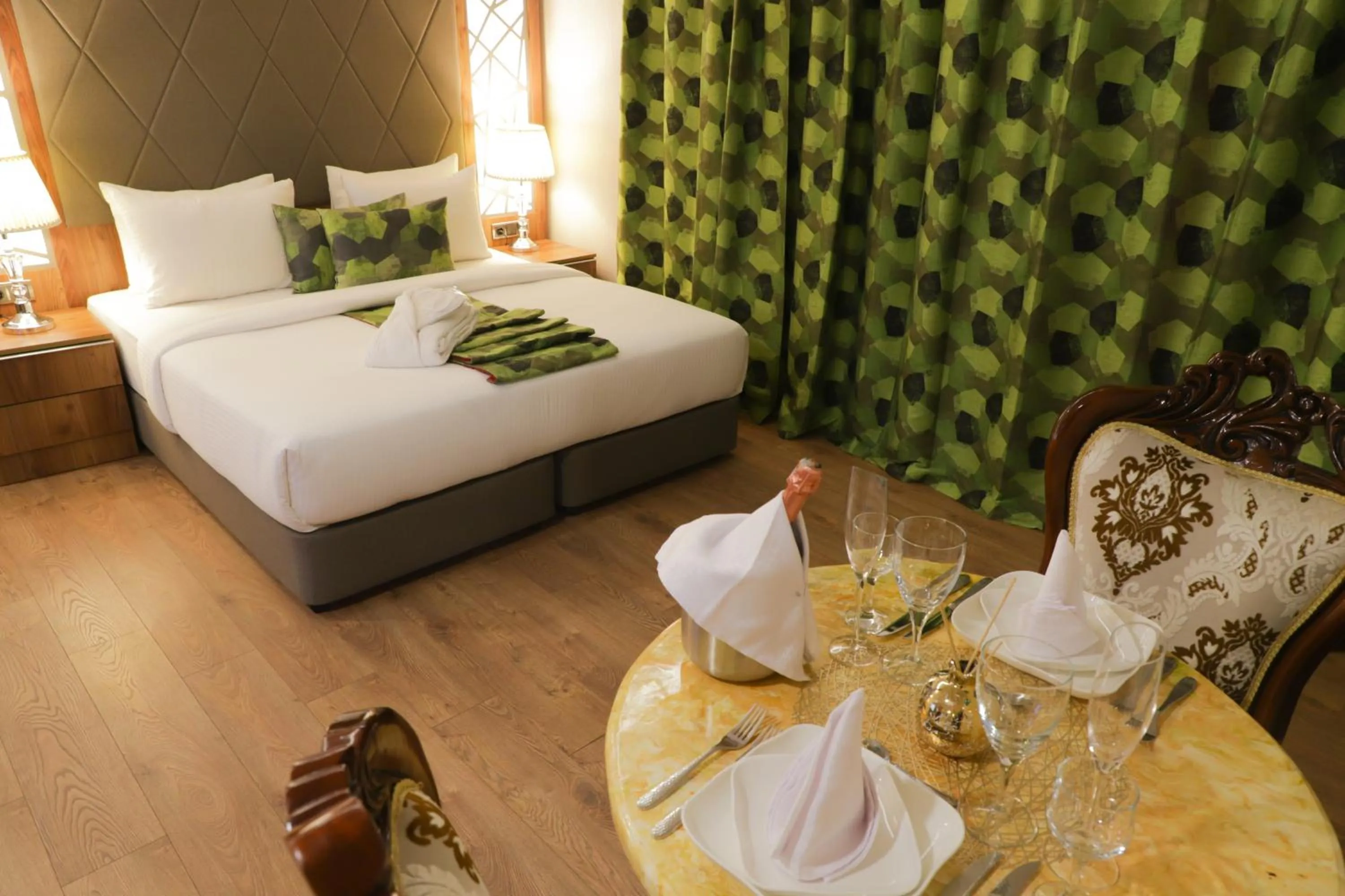 Bed in UNITED HOTEL INTERNATIONAL